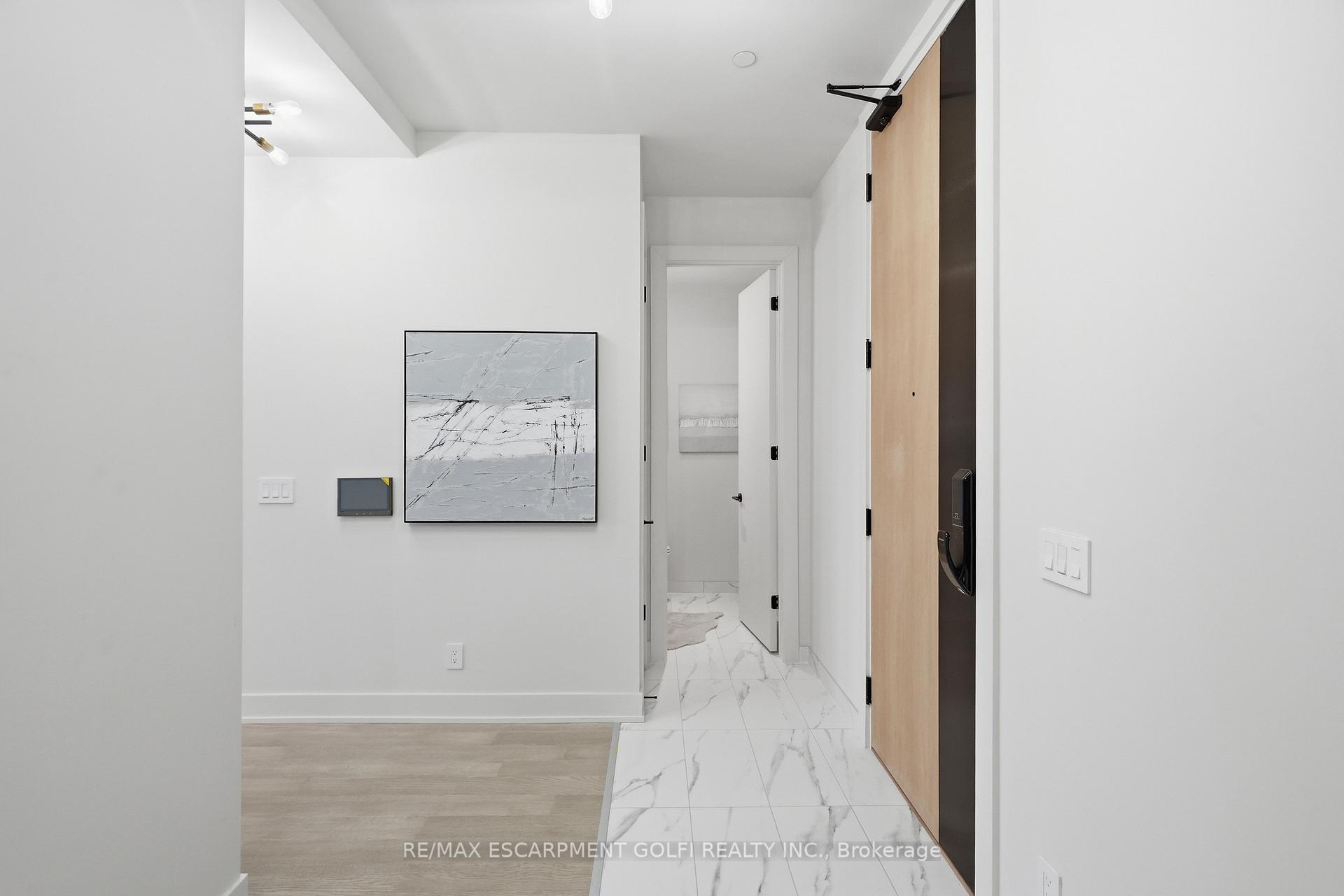 Photo 5 of Unit 409, 123 Maurice Drive, Oakville, Central — HOMEH