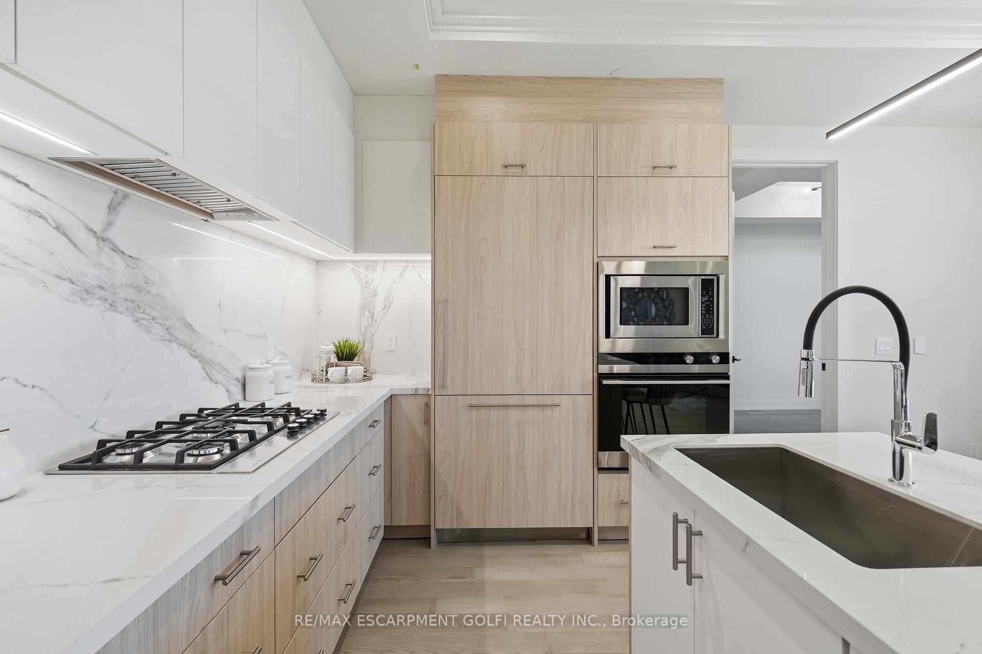 Photo 9 of Unit 409, 123 Maurice Drive, Oakville, Central — HOMEH
