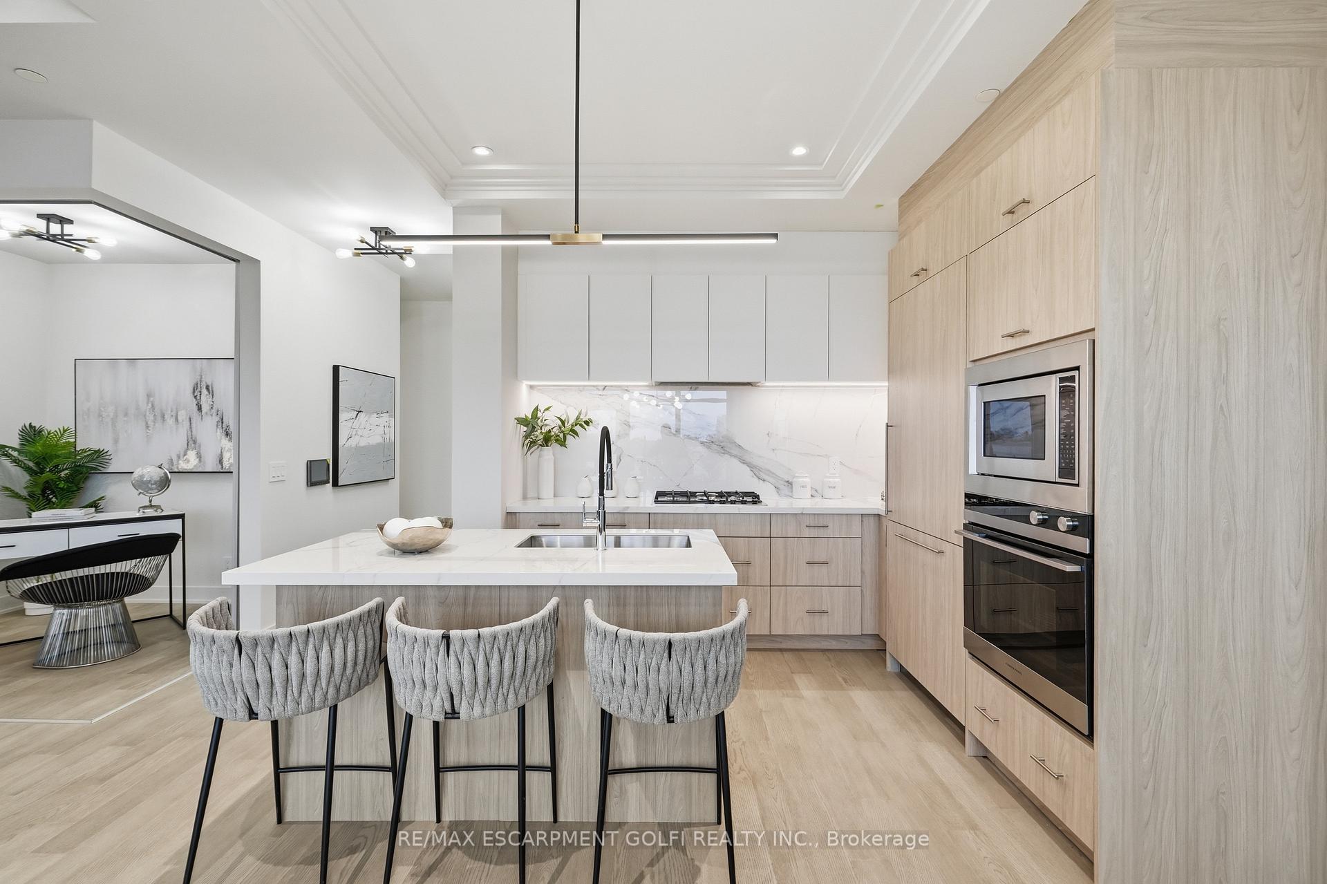 Photo 11 of Unit 409, 123 Maurice Drive, Oakville, Central — HOMEH