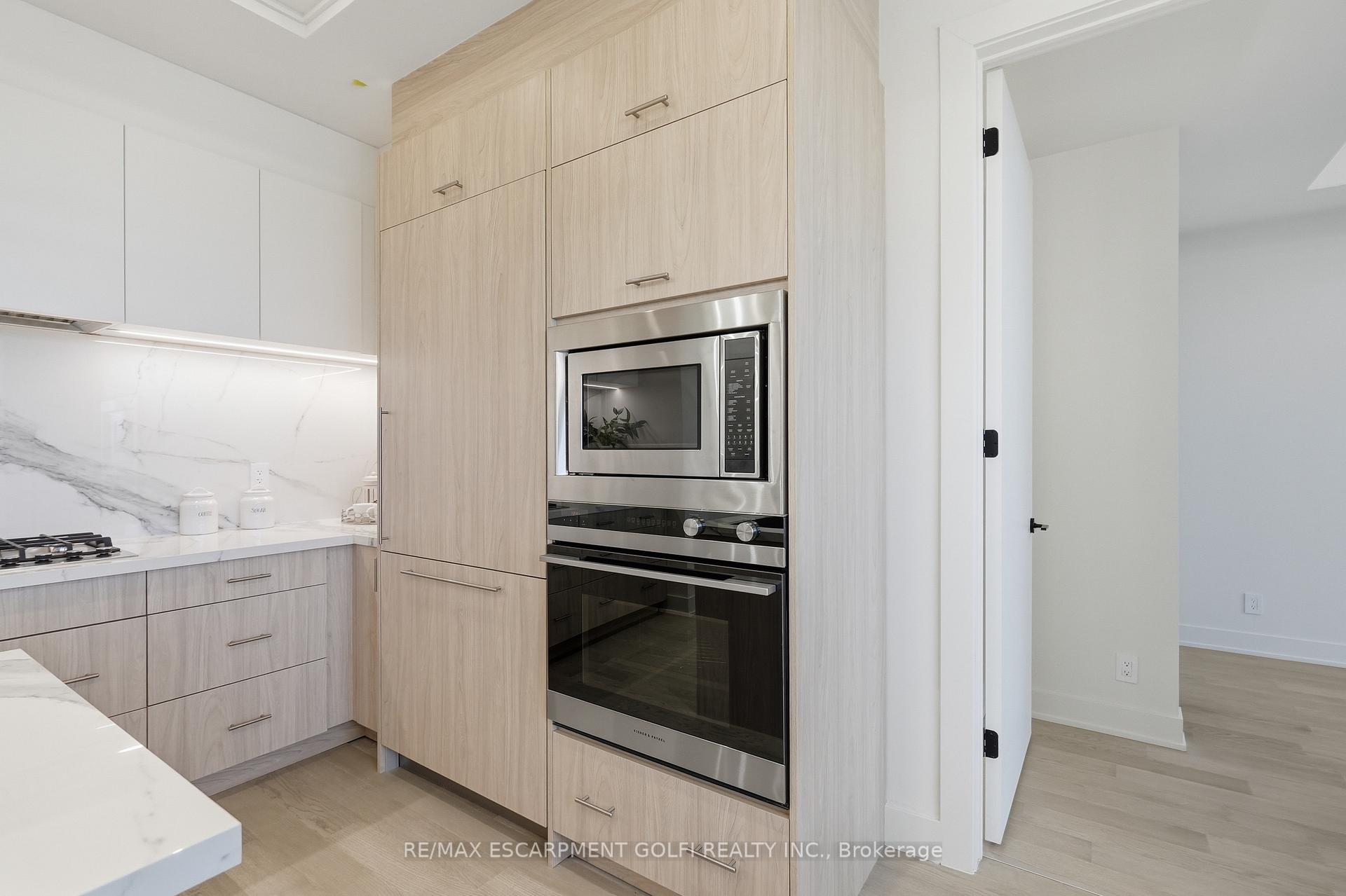 Photo 12 of Unit 409, 123 Maurice Drive, Oakville, Central — HOMEH