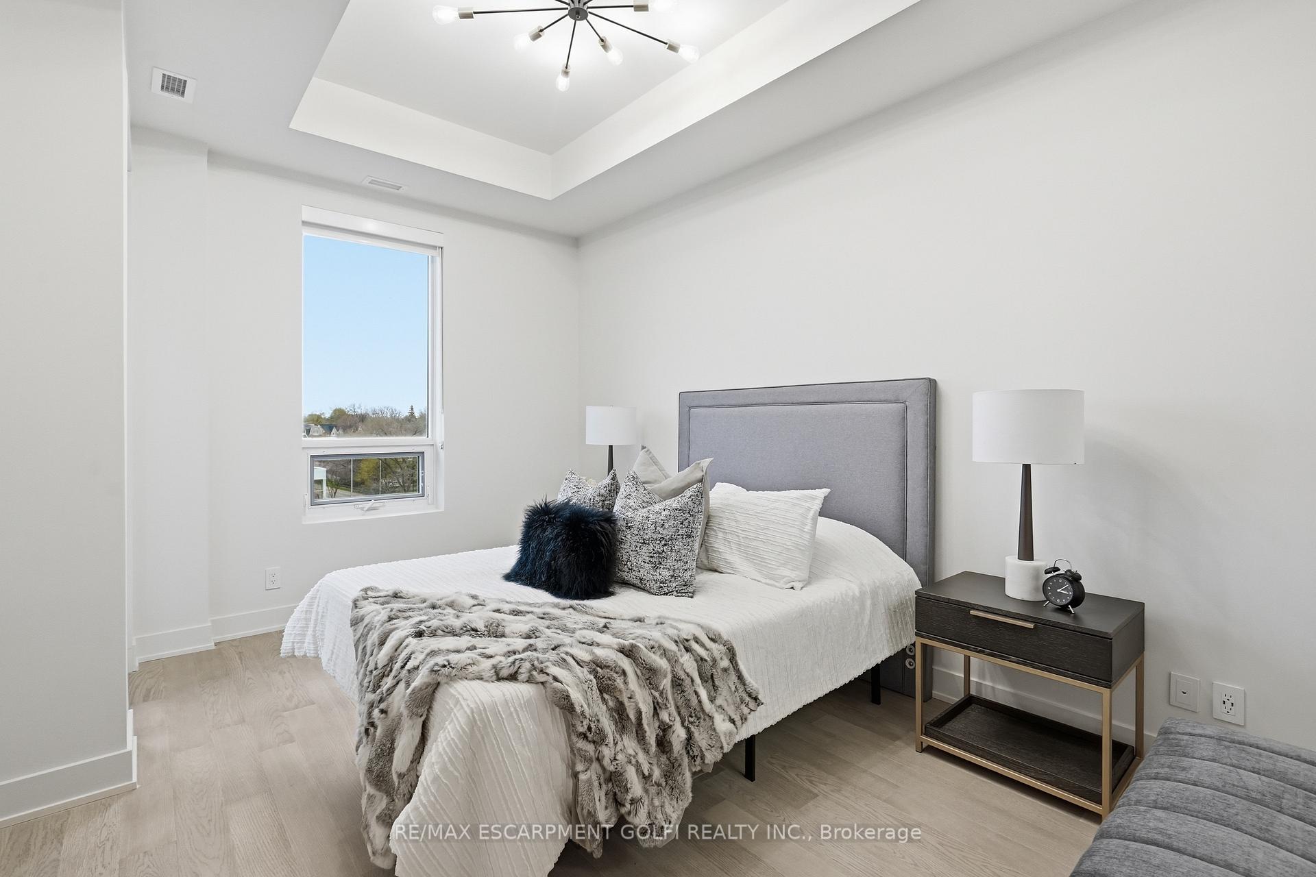 Photo 16 of Unit 409, 123 Maurice Drive, Oakville, Central — HOMEH