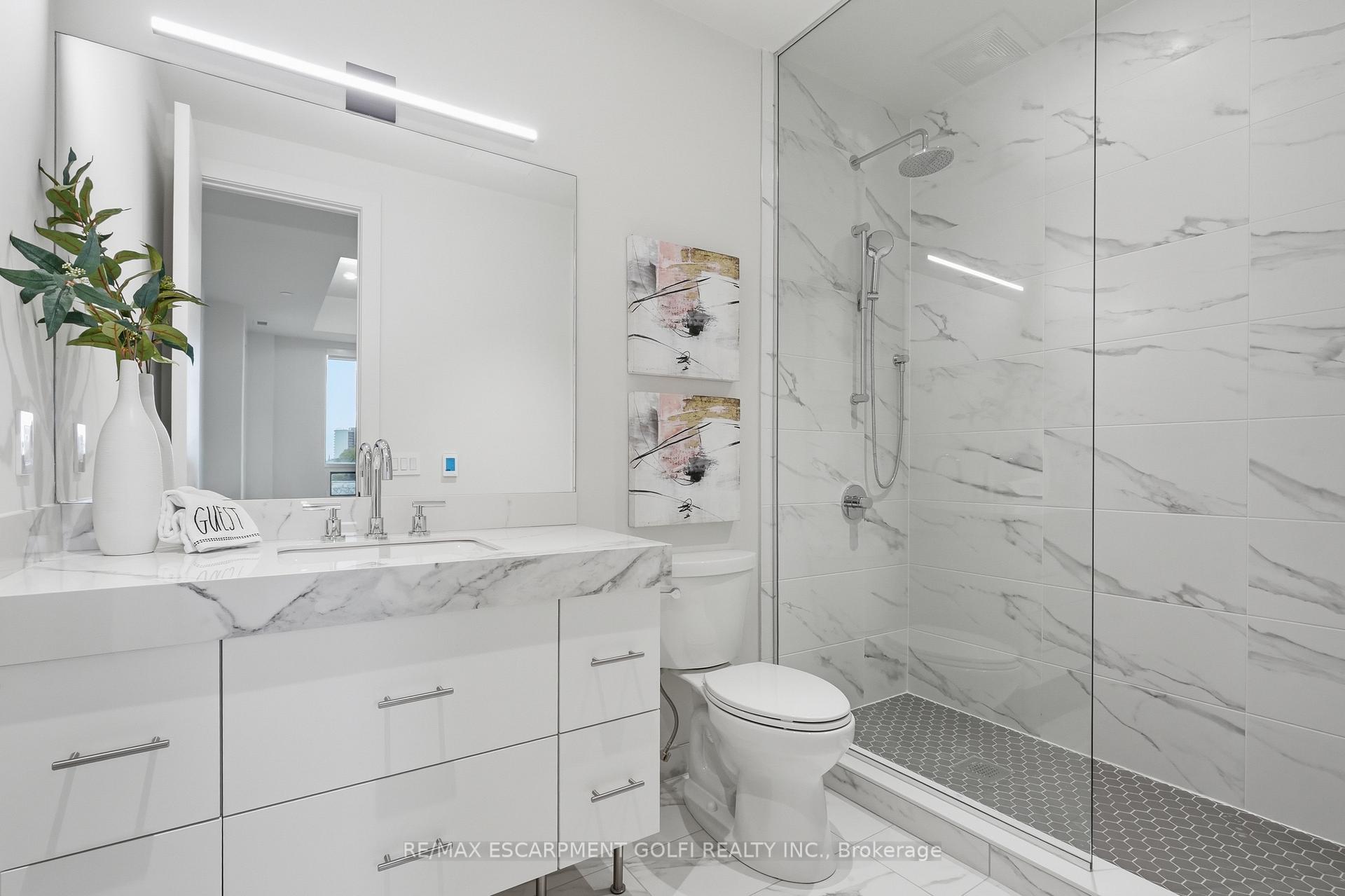 Photo 22 of Unit 409, 123 Maurice Drive, Oakville, Central — HOMEH