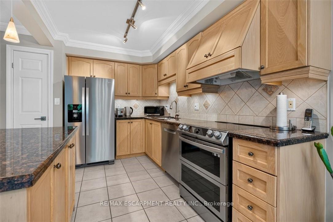 Photo 21 of Unit 8, 2151 Walkers Line, Burlington, Rose — HOMEH