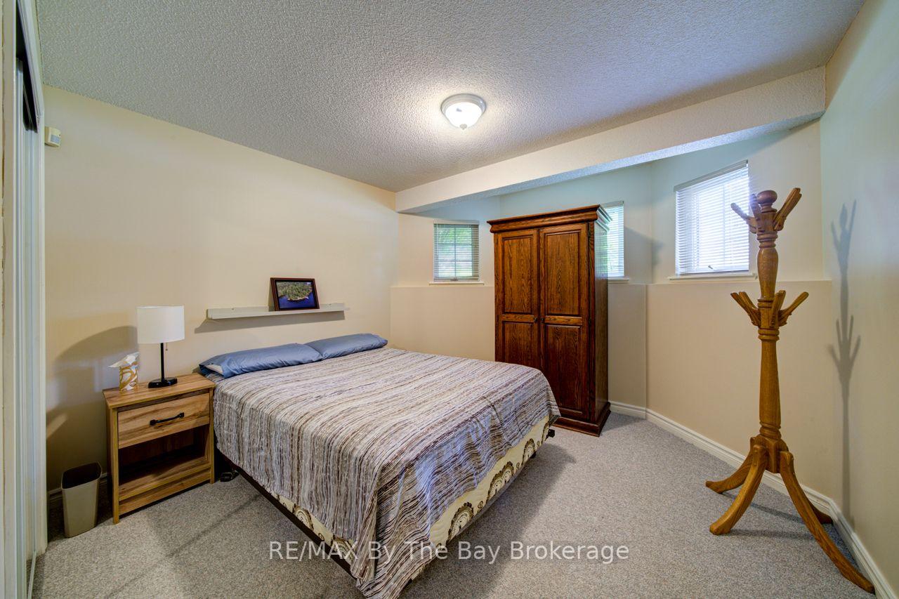 Photo 40 of 22 Downer Crescent, Wasaga Beach — HOMEH