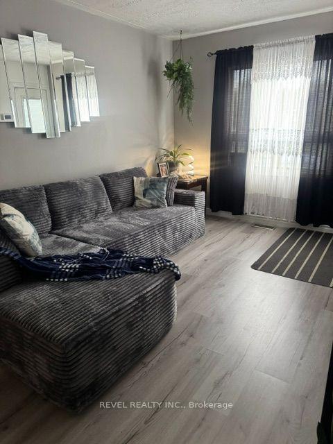 Photo 2 of 393 Pine Street N, Timmins, TNE - Central — HOMEH