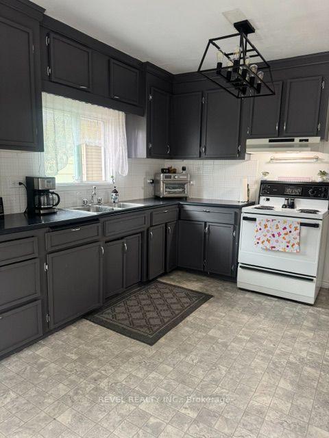 Photo 4 of 393 Pine Street N, Timmins, TNE - Central — HOMEH
