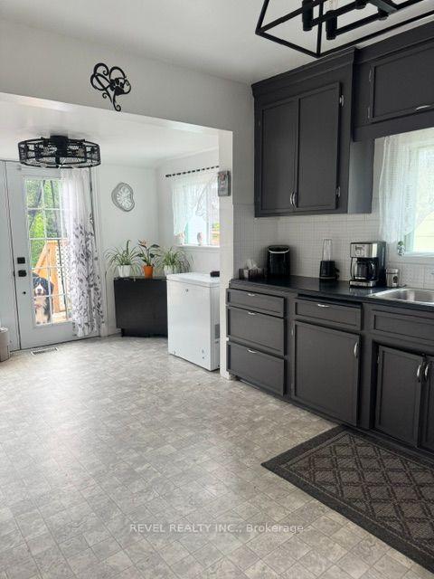 Photo 5 of 393 Pine Street N, Timmins, TNE - Central — HOMEH
