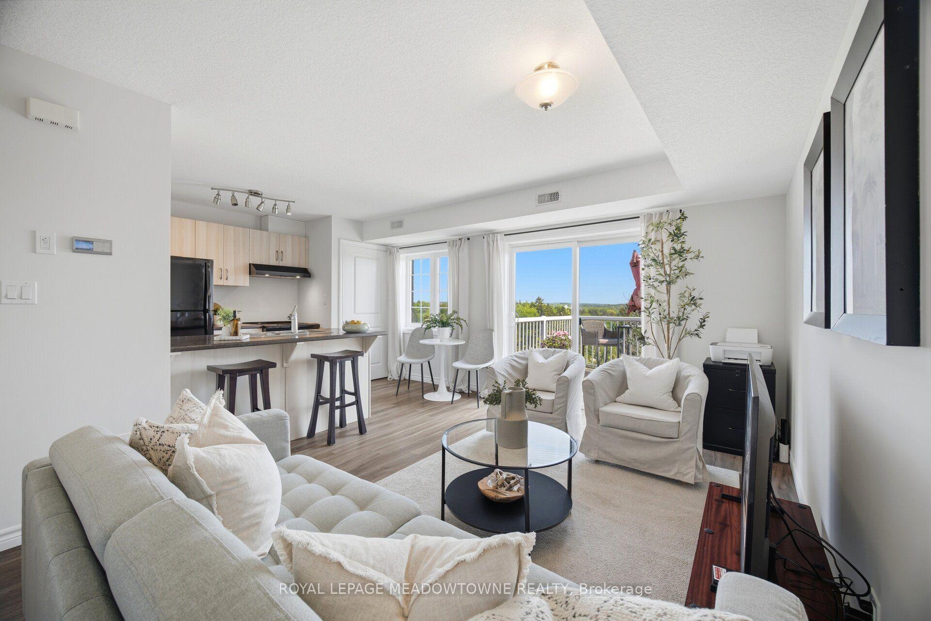 Photo 2 of Unit 207, 7 Cityview Drive S, Guelph, Grange Road — HOMEH