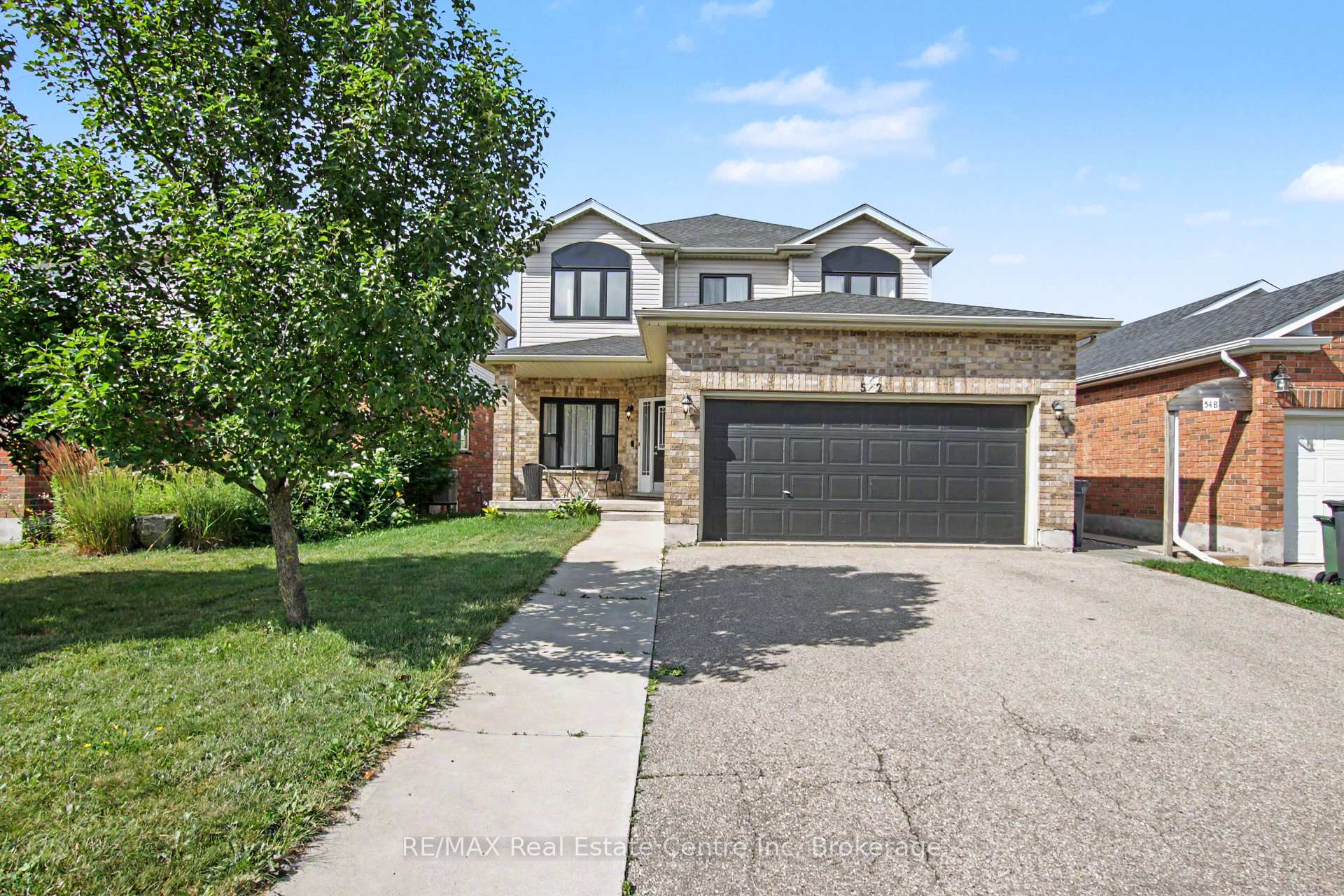 Photo 1 of 52 Washburn Drive, Guelph, Grange Road — HOMEH