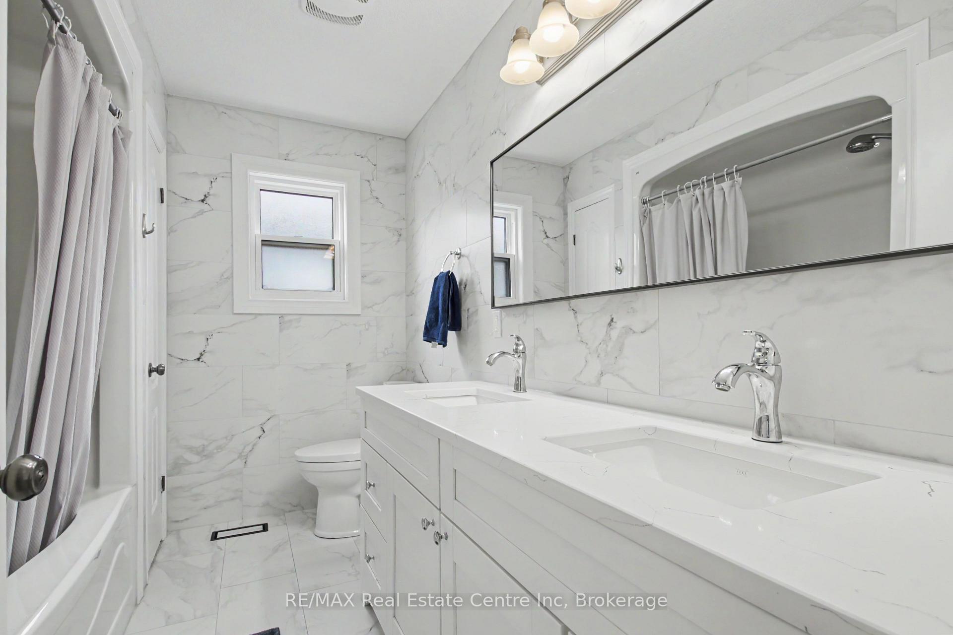 Photo 23 of 52 Washburn Drive, Guelph, Grange Road — HOMEH