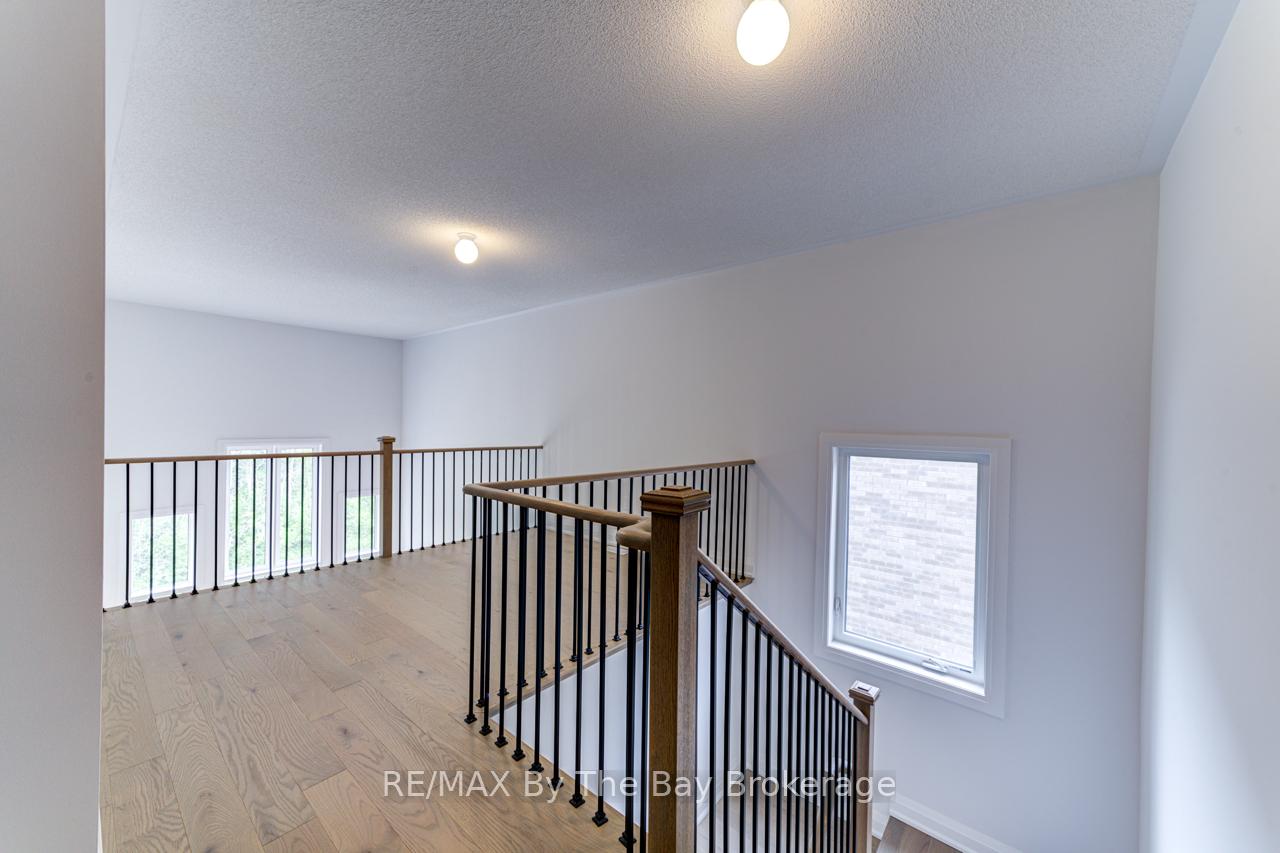 Photo 11 of 26 Amber Drive, Wasaga Beach — HOMEH