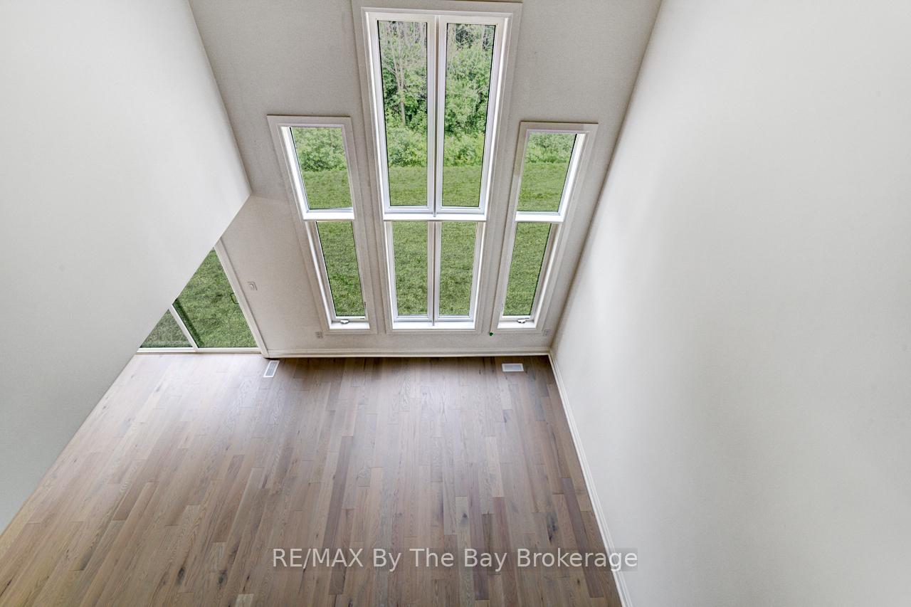 Photo 13 of 26 Amber Drive, Wasaga Beach — HOMEH