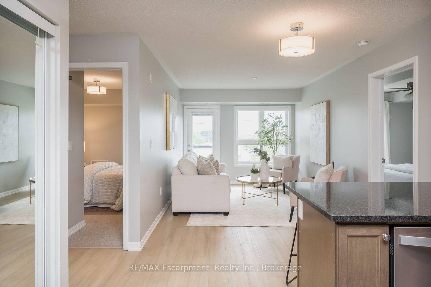 Photo 2 of Unit 307, 1045 Nadalin Heights, Milton, Willmott — HOMEH