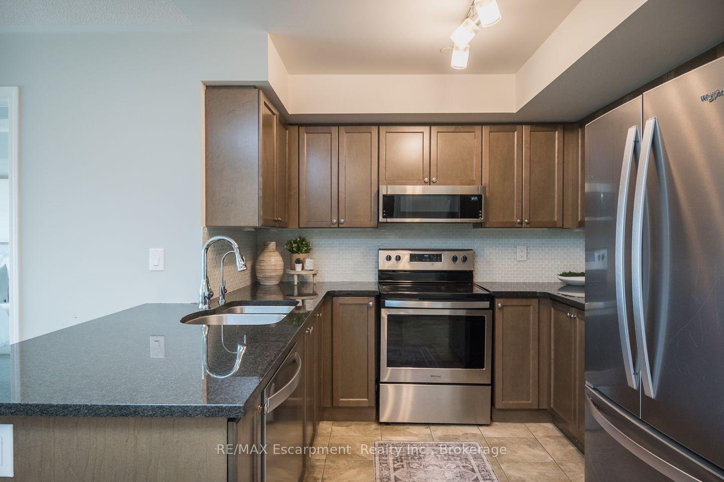 Photo 10 of Unit 307, 1045 Nadalin Heights, Milton, Willmott — HOMEH
