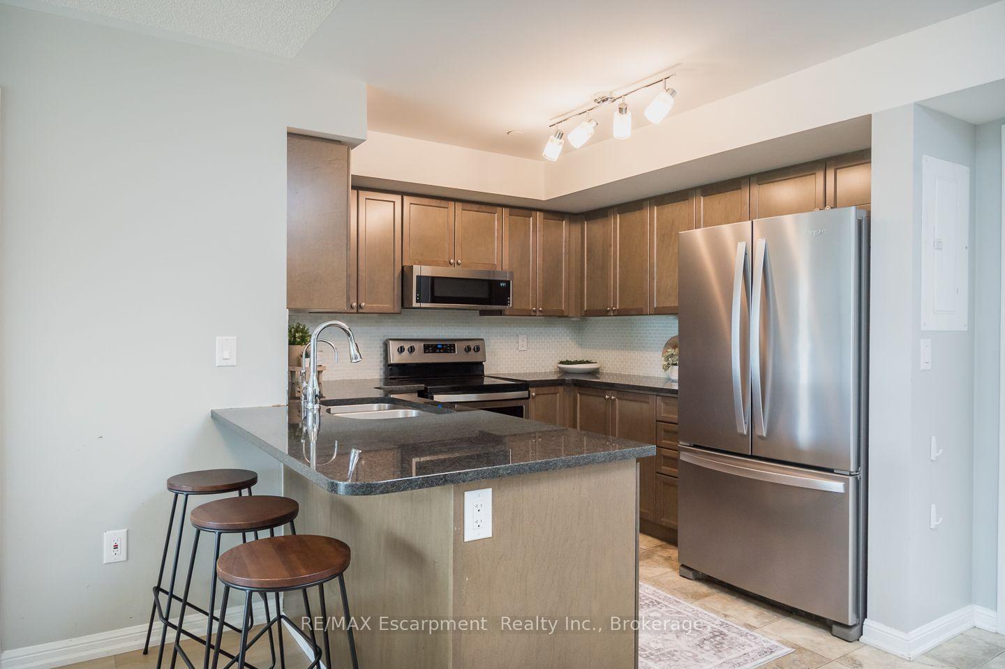 Photo 11 of Unit 307, 1045 Nadalin Heights, Milton, Willmott — HOMEH