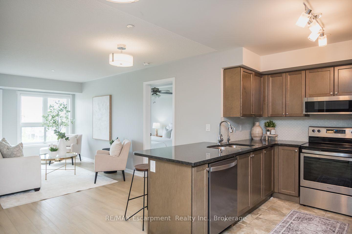 Photo 12 of Unit 307, 1045 Nadalin Heights, Milton, Willmott — HOMEH