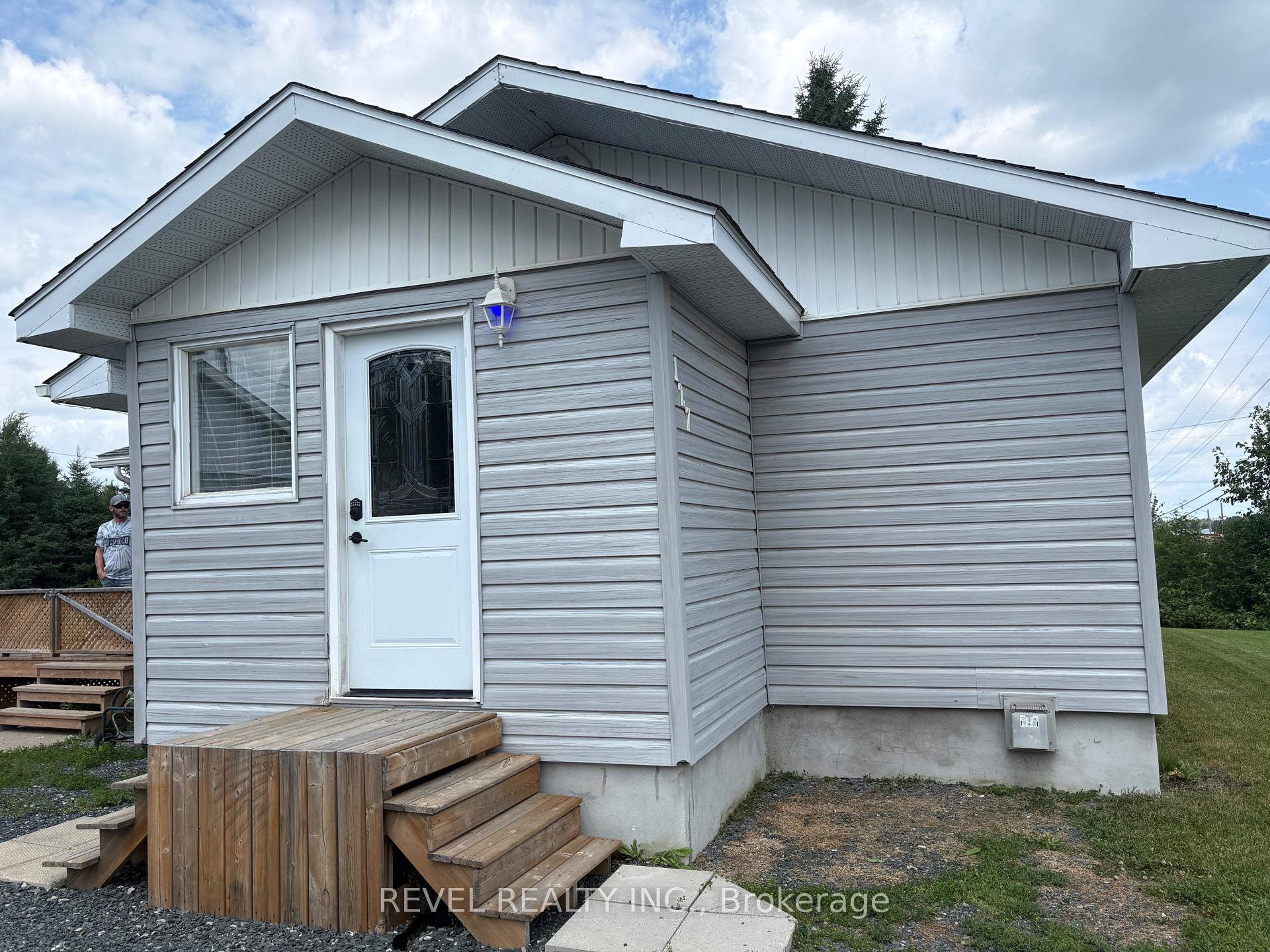 Photo 2 of 127 Genier Road, Cochrane — HOMEH
