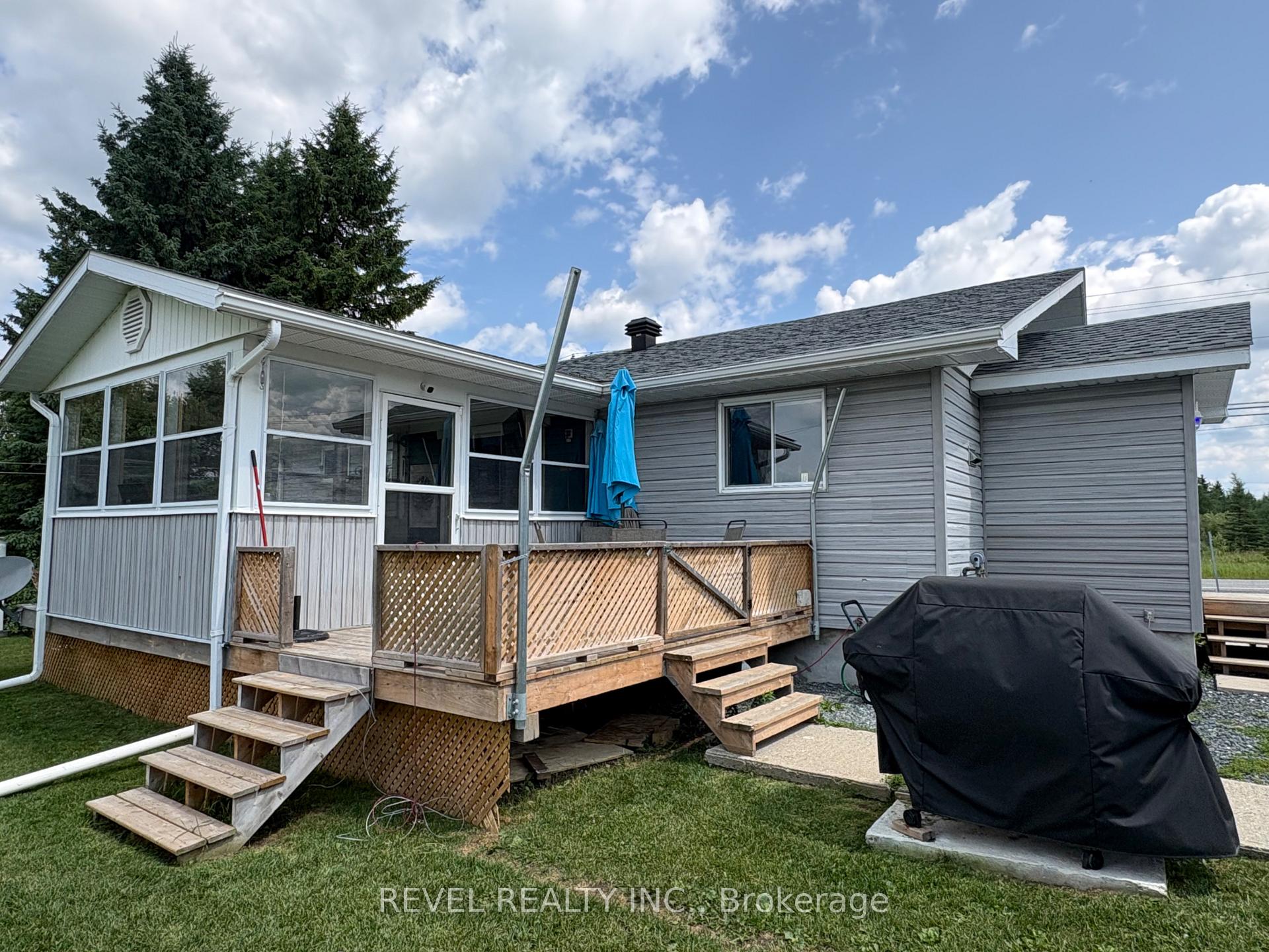 Photo 3 of 127 Genier Road, Cochrane — HOMEH