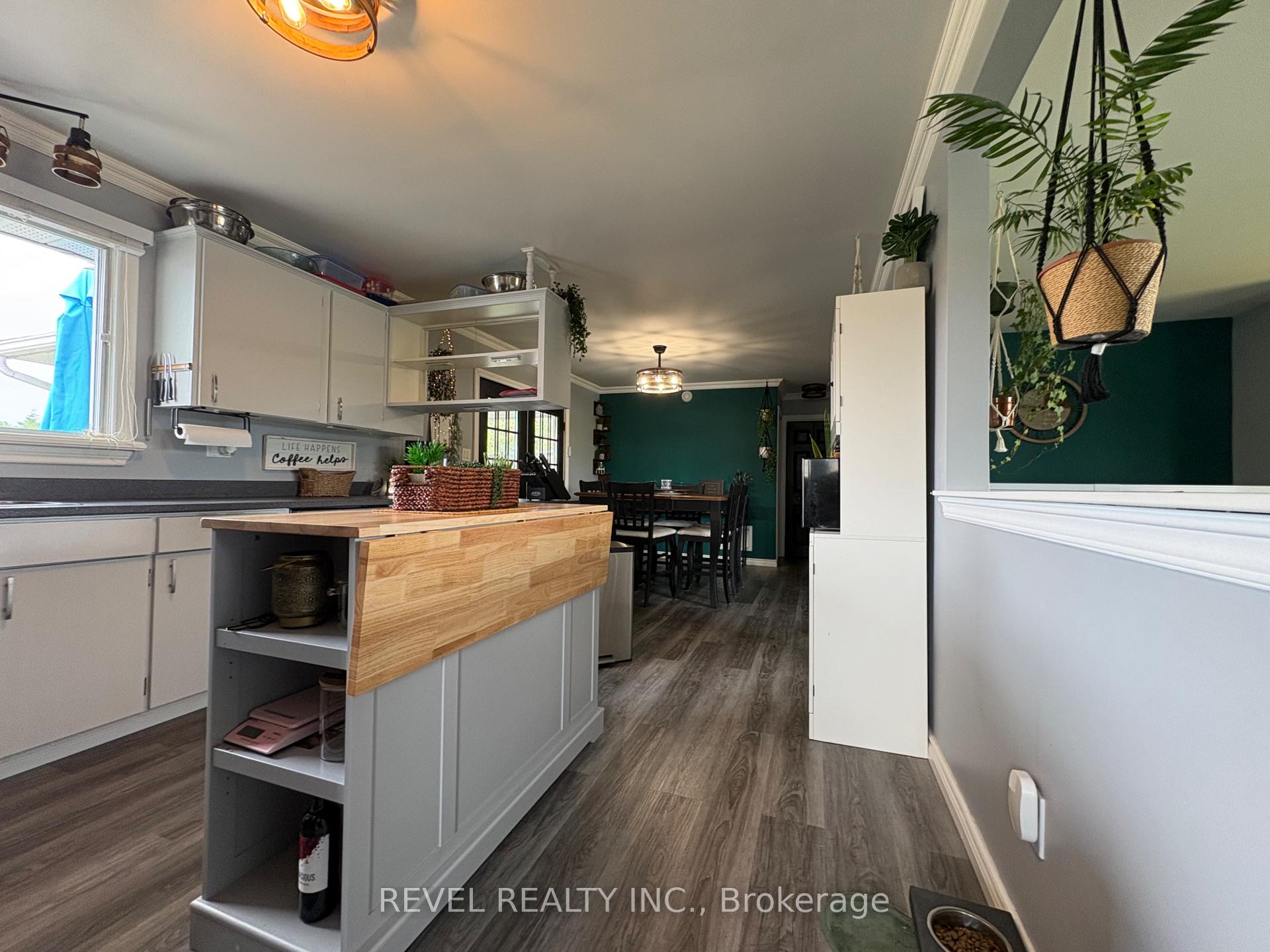 Photo 8 of 127 Genier Road, Cochrane — HOMEH