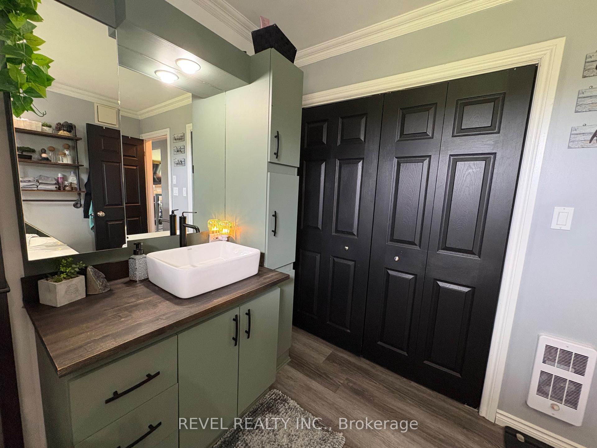 Photo 16 of 127 Genier Road, Cochrane — HOMEH