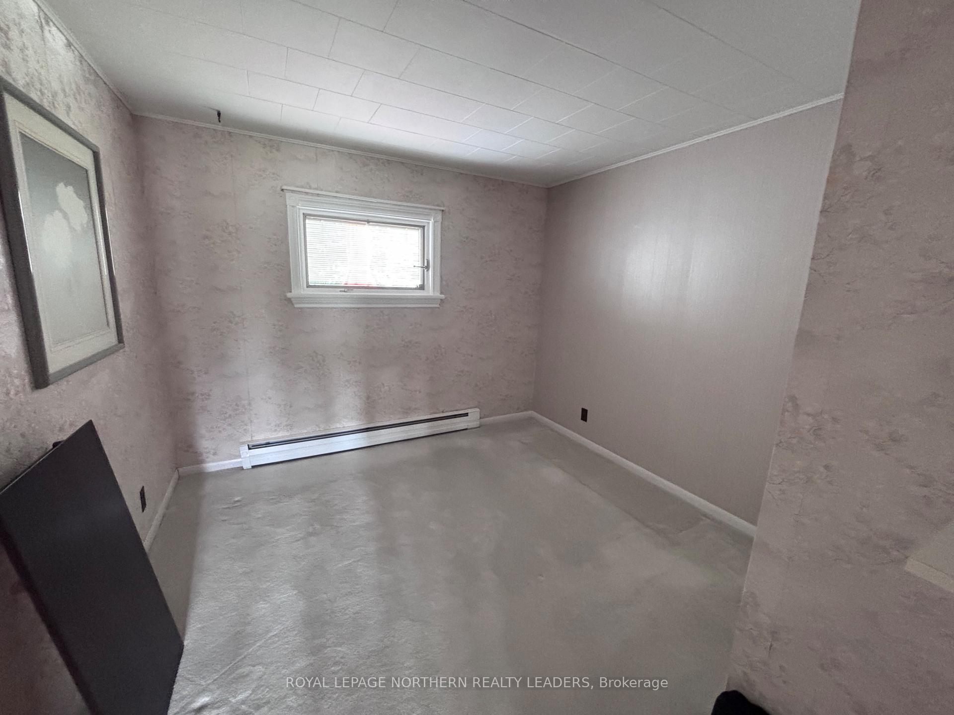 Photo 37 of 324 Third Avenue, Cochrane — HOMEH