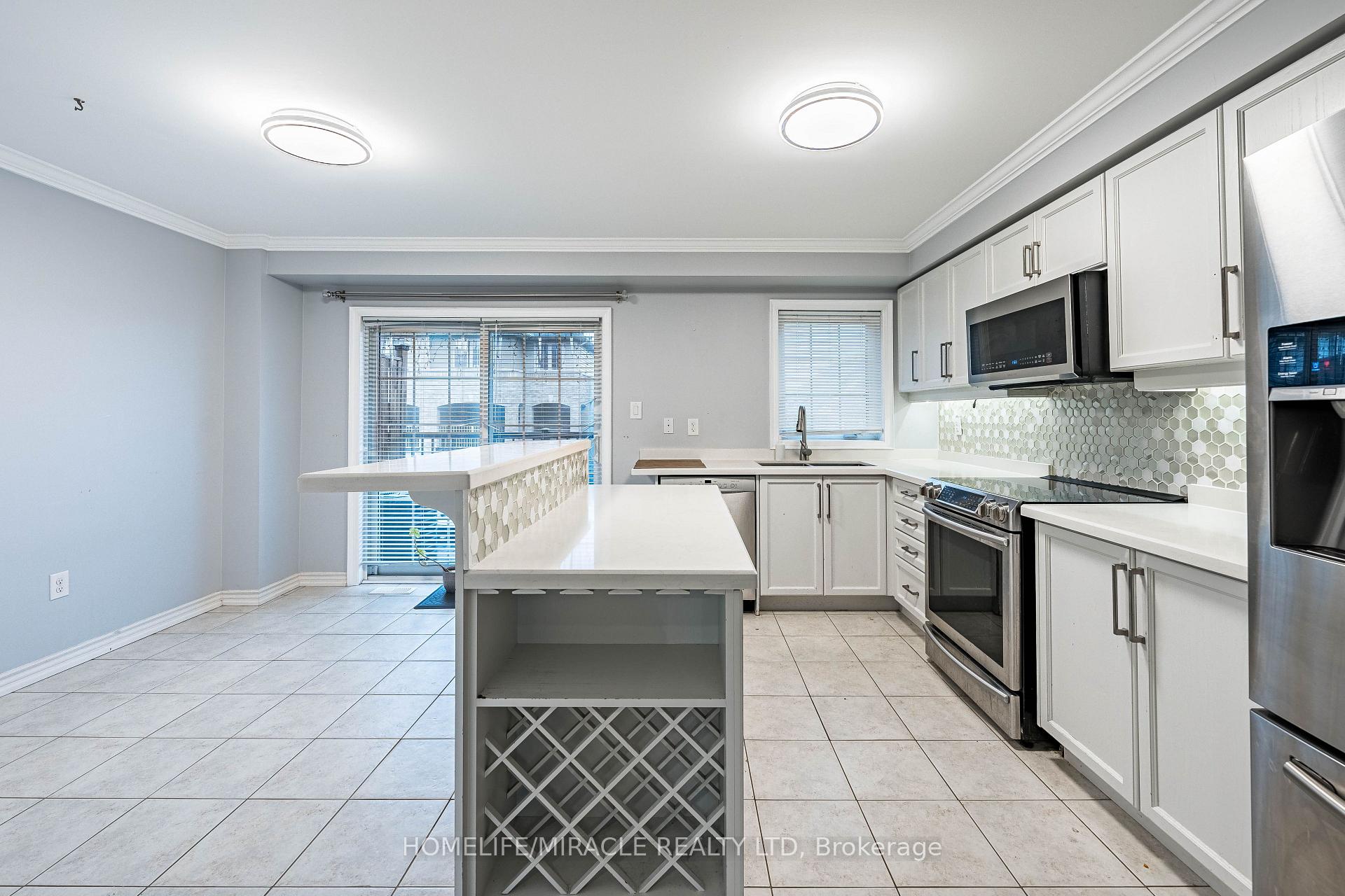 Photo 12 of 419 Rossland Road E, Ajax, Central East — HOMEH