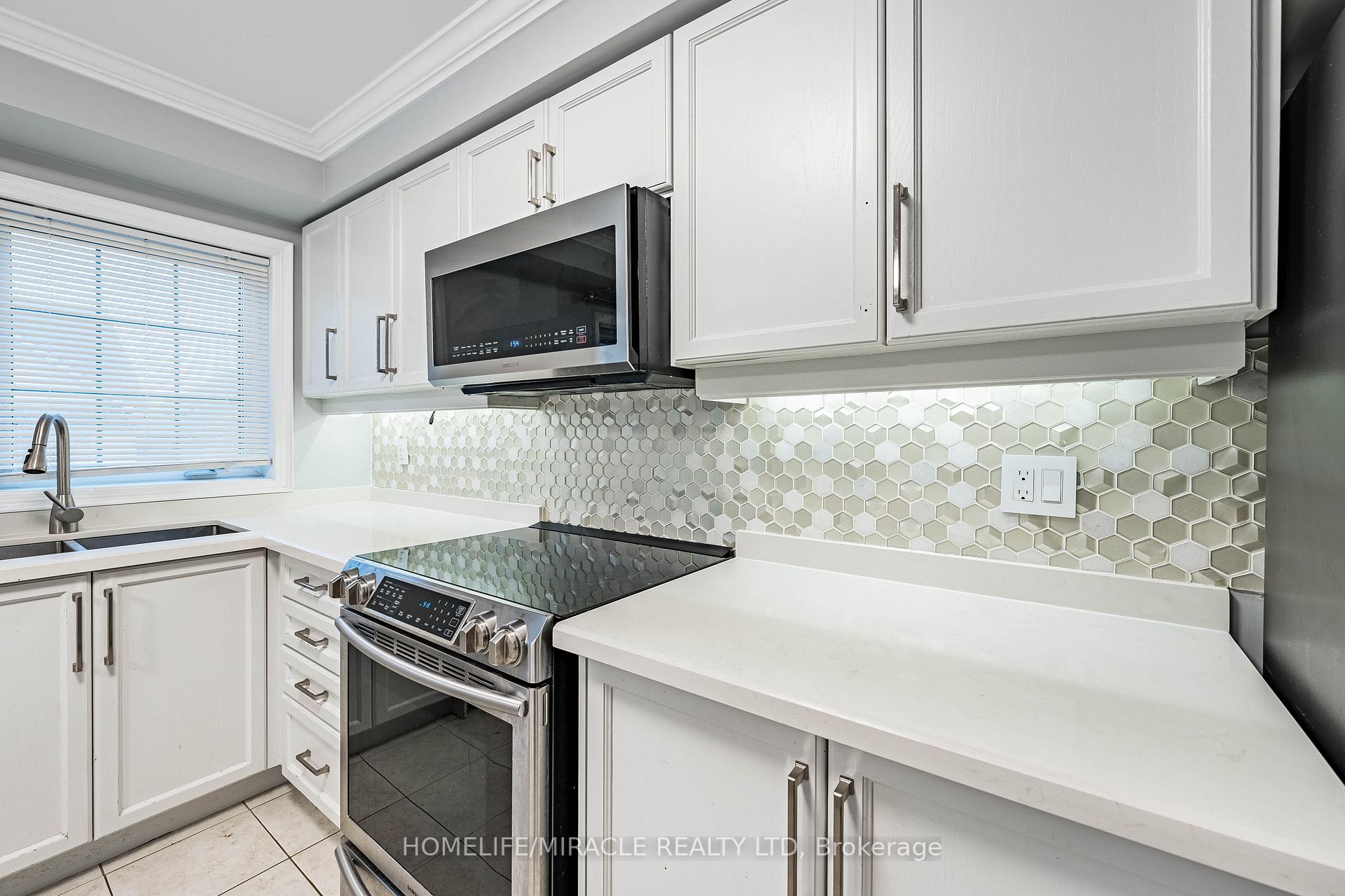 Photo 16 of 419 Rossland Road E, Ajax, Central East — HOMEH