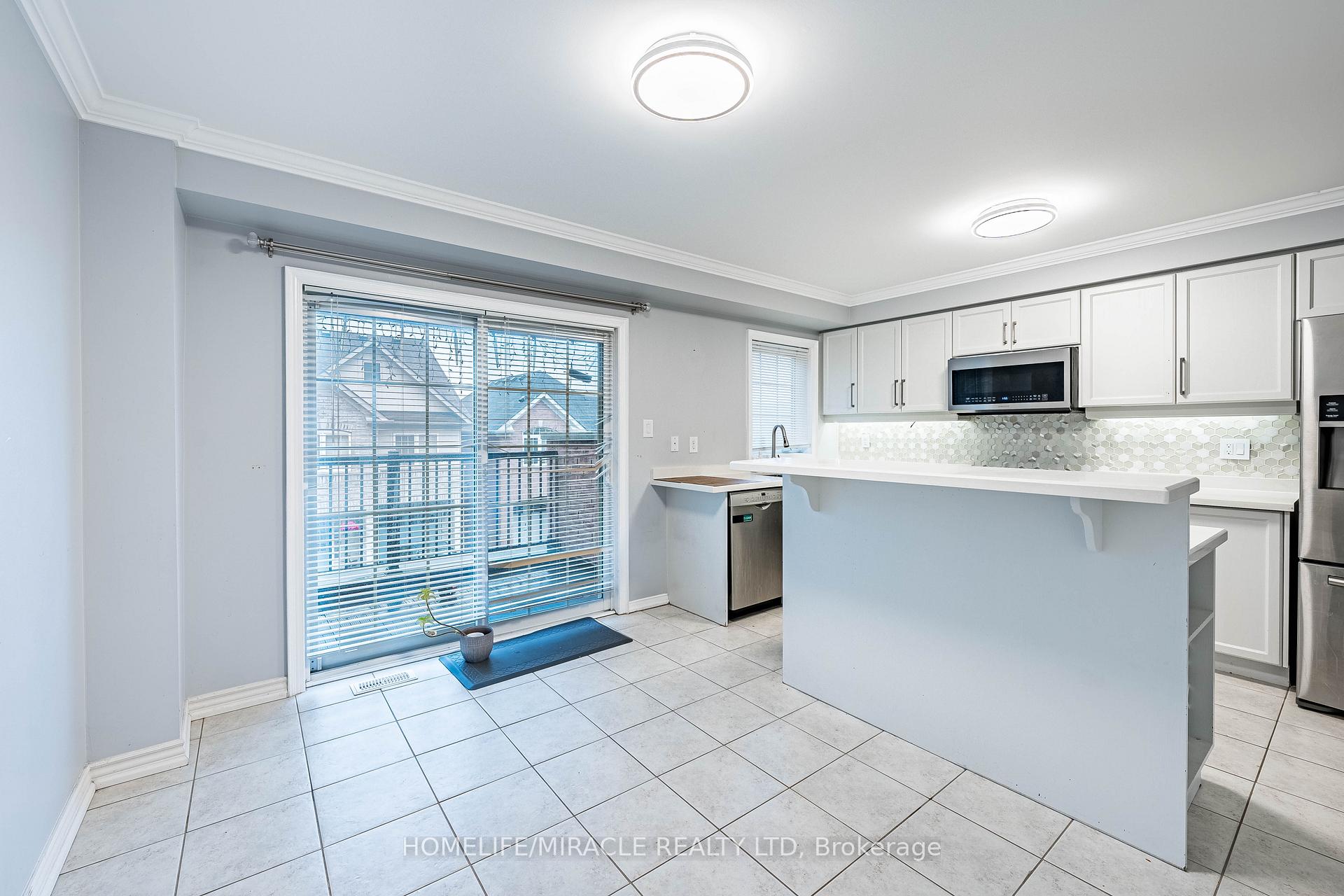 Photo 19 of 419 Rossland Road E, Ajax, Central East — HOMEH