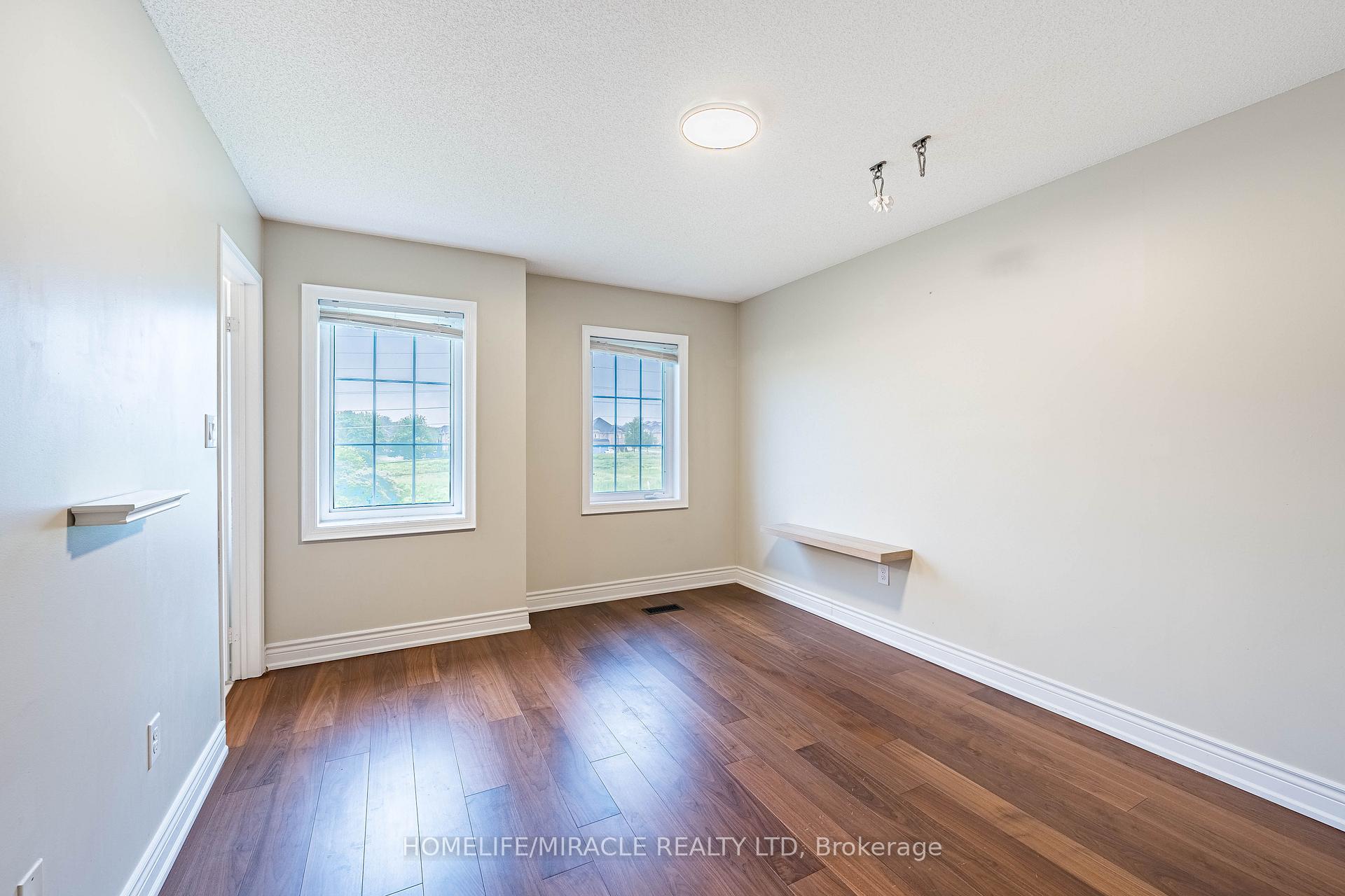 Photo 25 of 419 Rossland Road E, Ajax, Central East — HOMEH