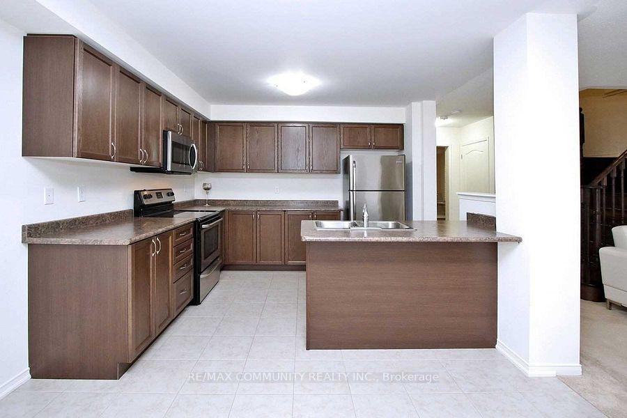 Photo 5 of 223 Windfields Farm Drive W, Oshawa, Windfields — HOMEH