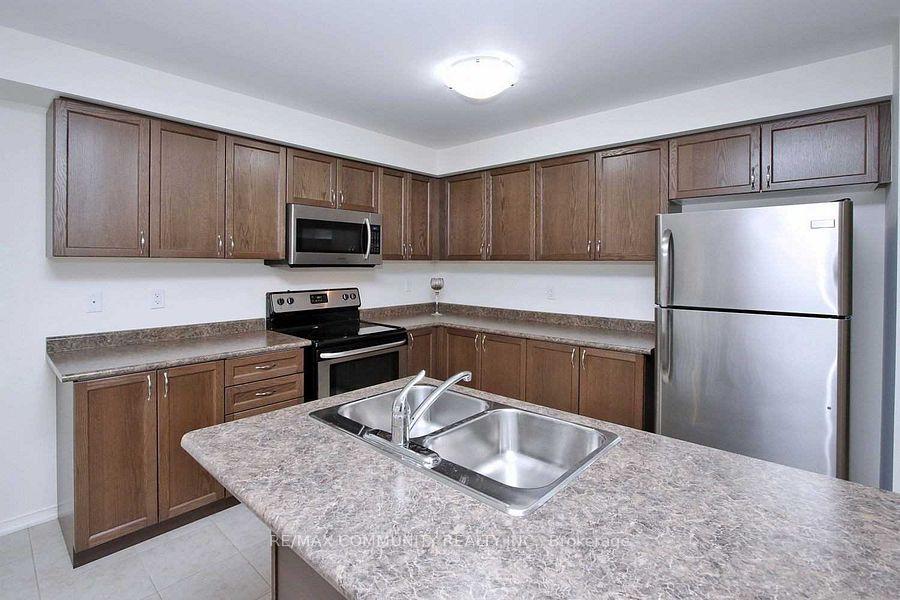 Photo 6 of 223 Windfields Farm Drive W, Oshawa, Windfields — HOMEH