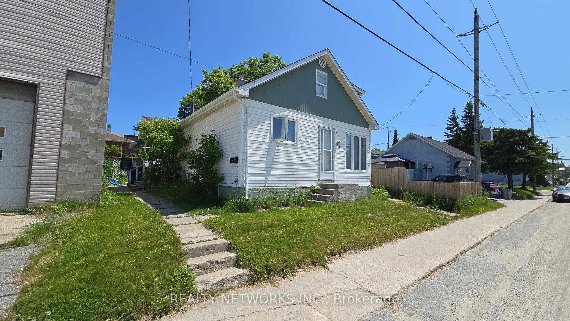 Photo 1 of 48 Cameron Street S, Timmins, TS - SW — HOMEH