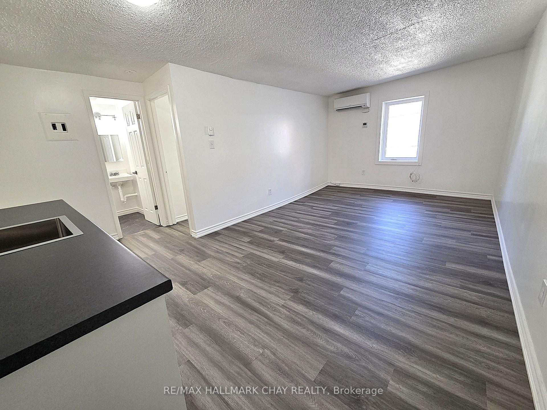 Photo 2 of Unit 4, 58 Queen Street W, Springwater, Elmvale — HOMEH