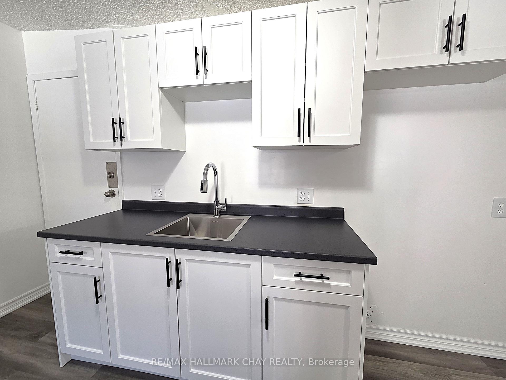Photo 3 of Unit 4, 58 Queen Street W, Springwater, Elmvale — HOMEH
