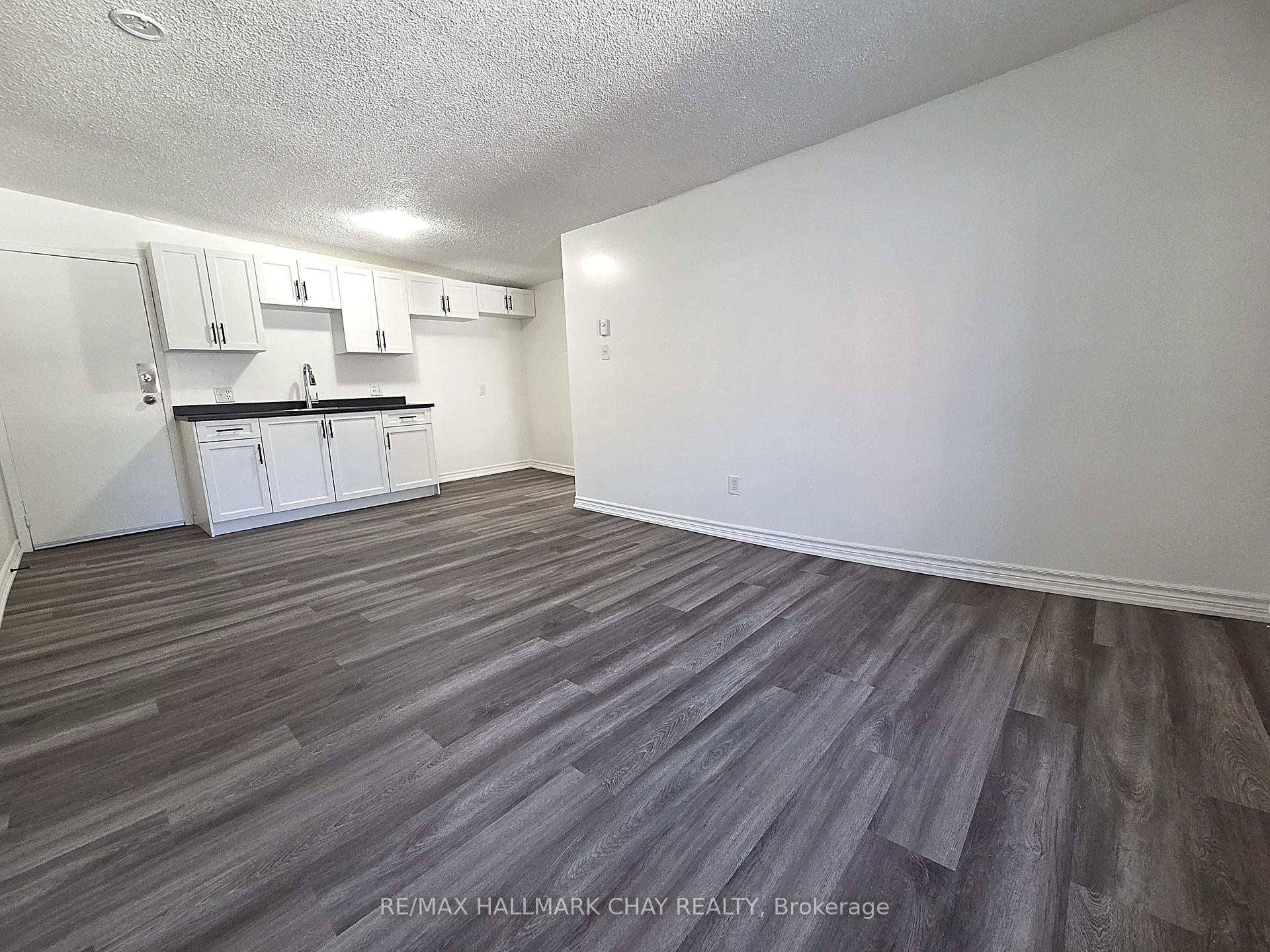 Photo 5 of Unit 4, 58 Queen Street W, Springwater, Elmvale — HOMEH