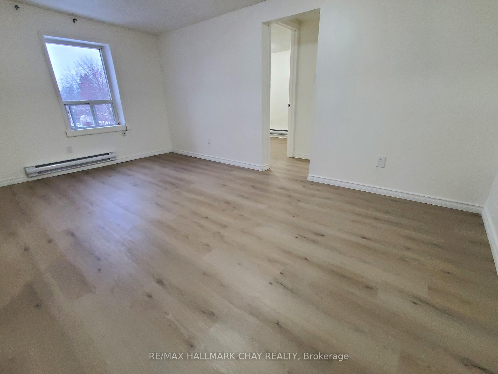 Photo 2 of Unit 6, 58 Queen Street W, Springwater, Elmvale — HOMEH