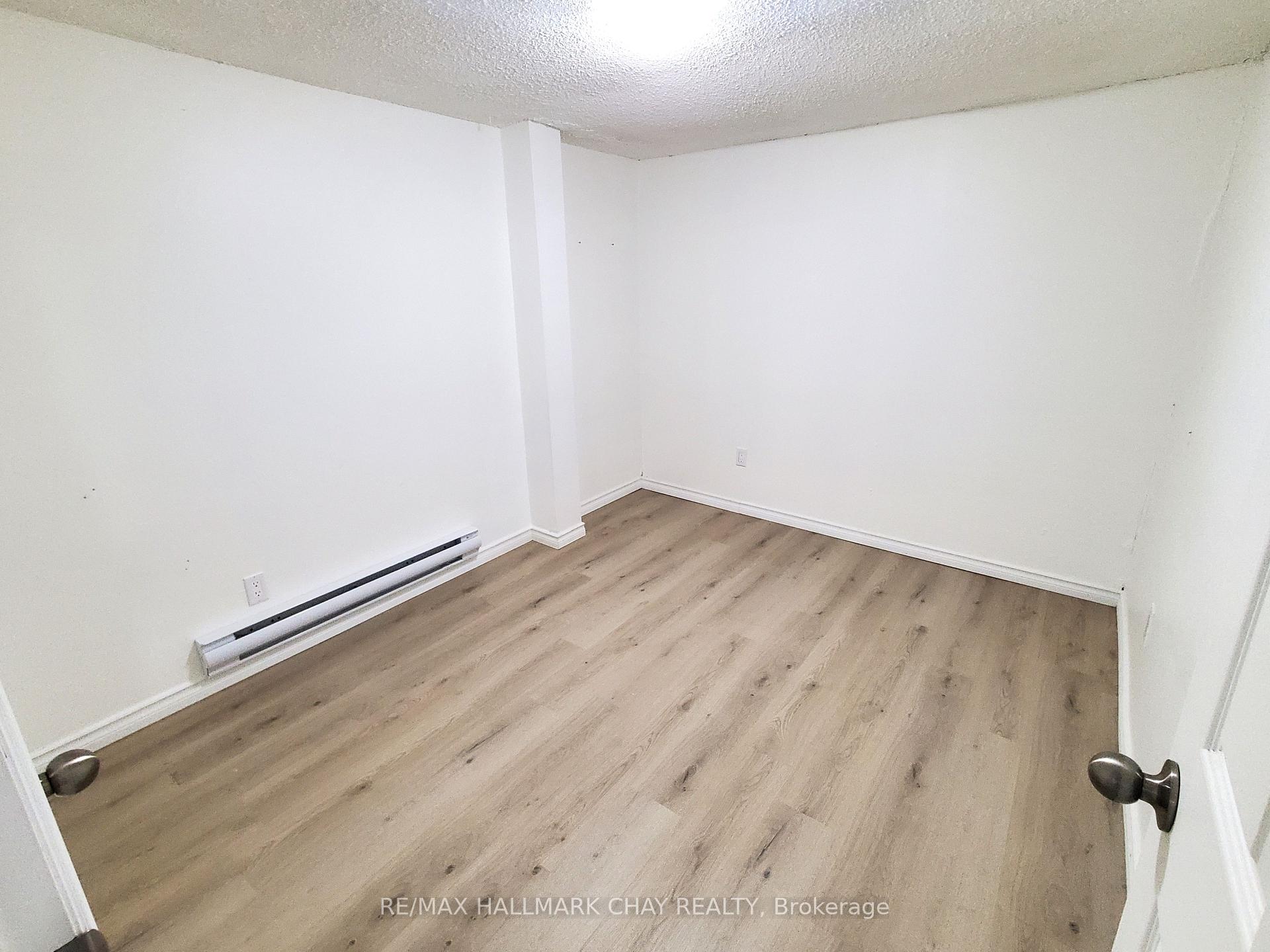 Photo 4 of Unit 6, 58 Queen Street W, Springwater, Elmvale — HOMEH