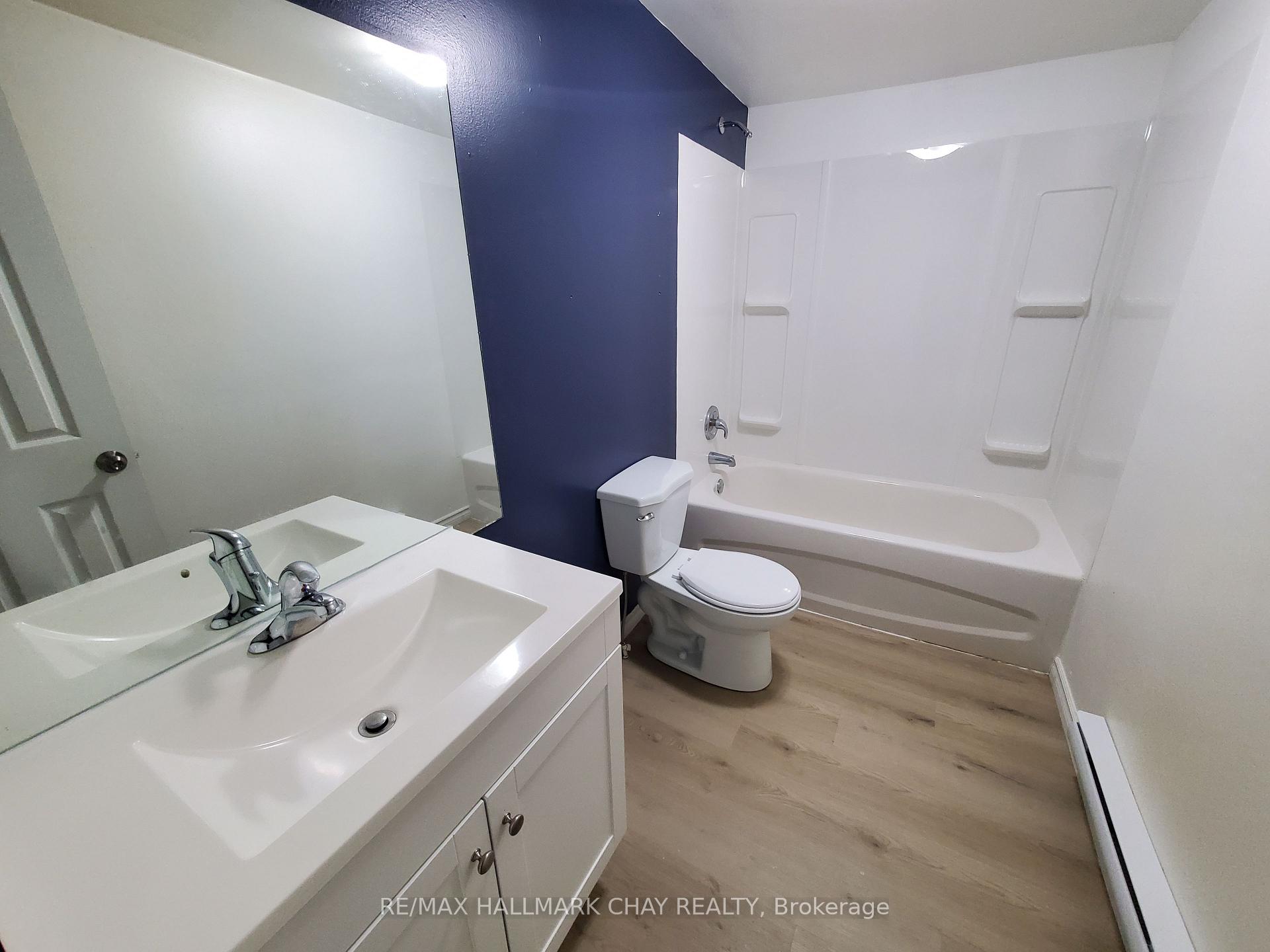 Photo 7 of Unit 6, 58 Queen Street W, Springwater, Elmvale — HOMEH