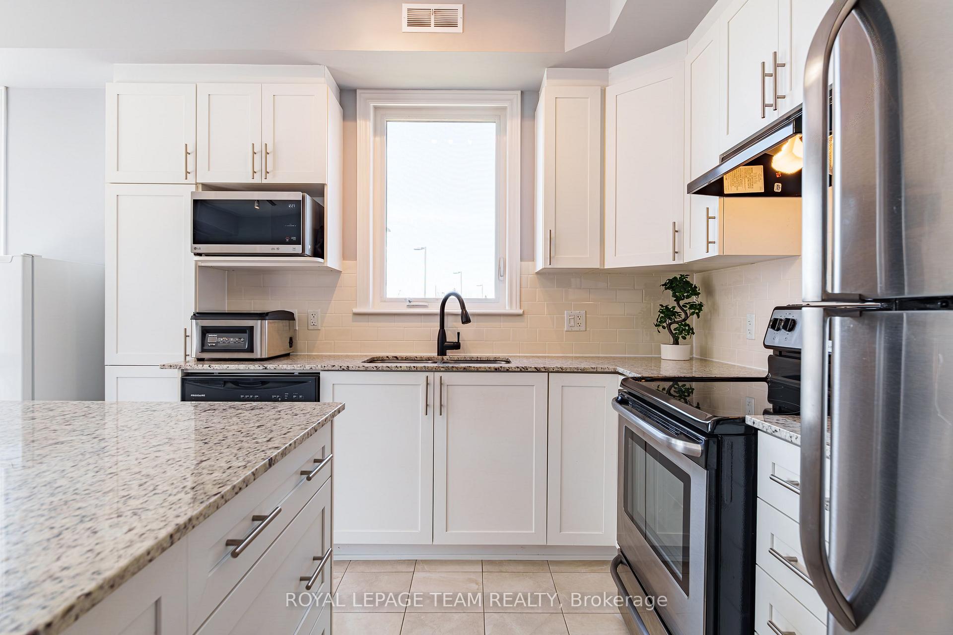 Photo 5 of Unit E, 67 Tipperary Private, Ottawa, Barrhaven - Longfields — HOMEH