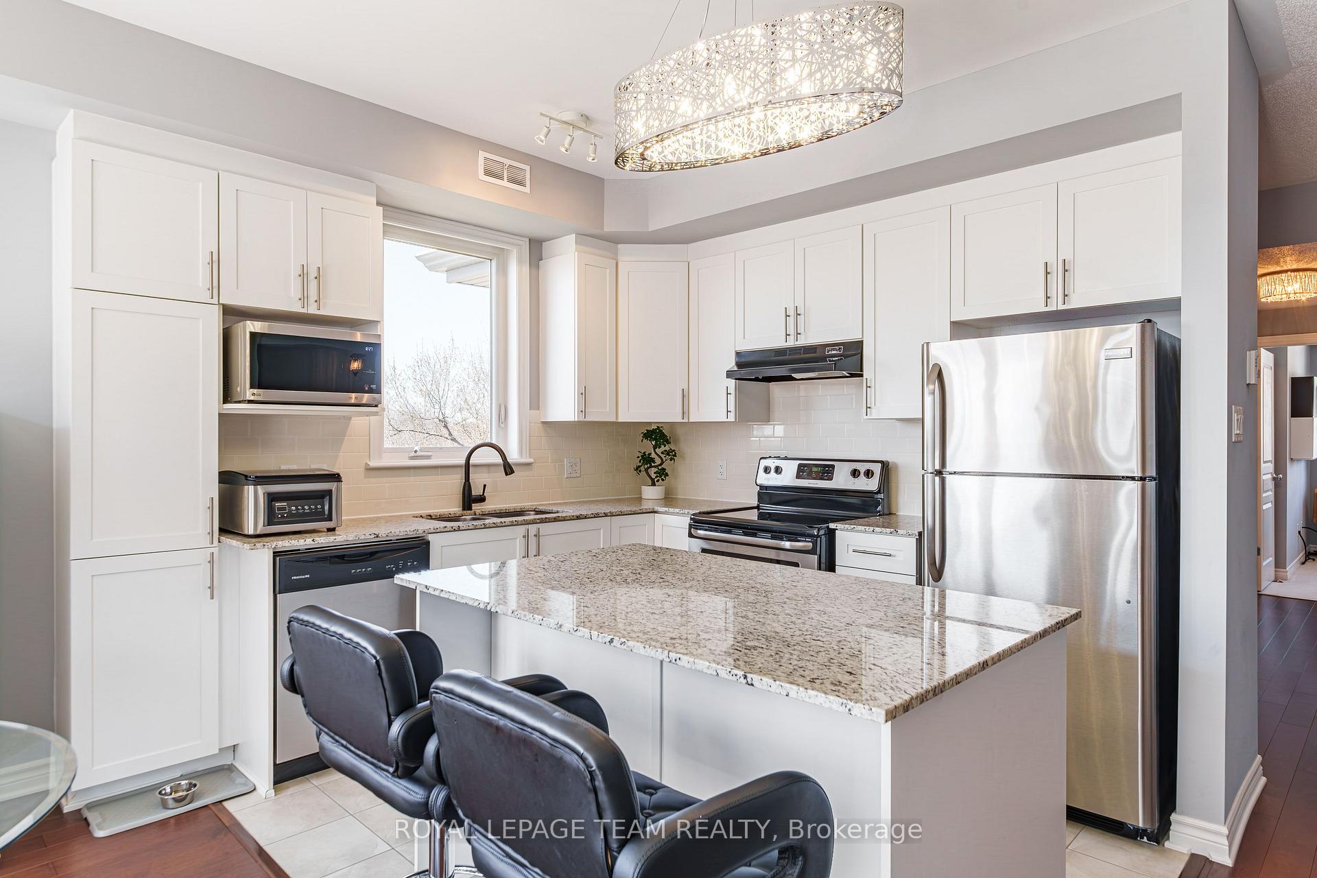 Photo 6 of Unit E, 67 Tipperary Private, Ottawa, Barrhaven - Longfields — HOMEH