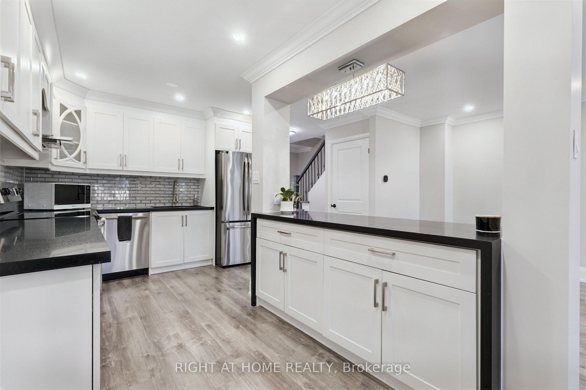 Photo 6 of Unit 2, 4191 Longmoor Drive, Burlington, Shoreacres — HOMEH
