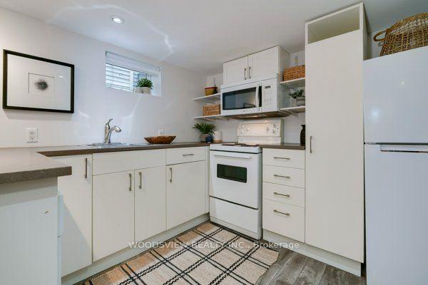 Photo 9 of 237 Rhodes Avenue, Toronto, Greenwood-Coxwell — HOMEH