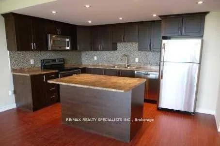 Photo 2 of Unit 413, 188 Mill Street S, Brampton, Brampton South — HOMEH