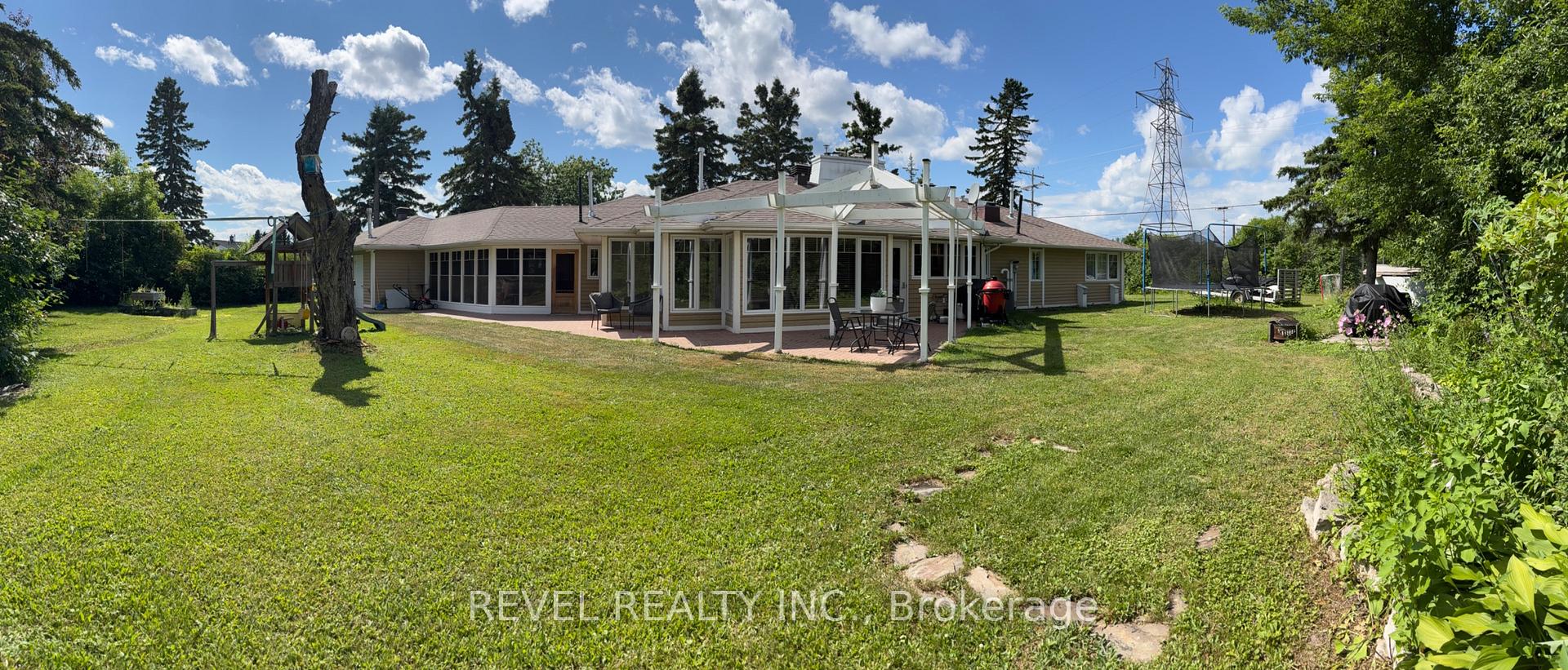 Photo 43 of 414 Ninth Avenue, Cochrane — HOMEH