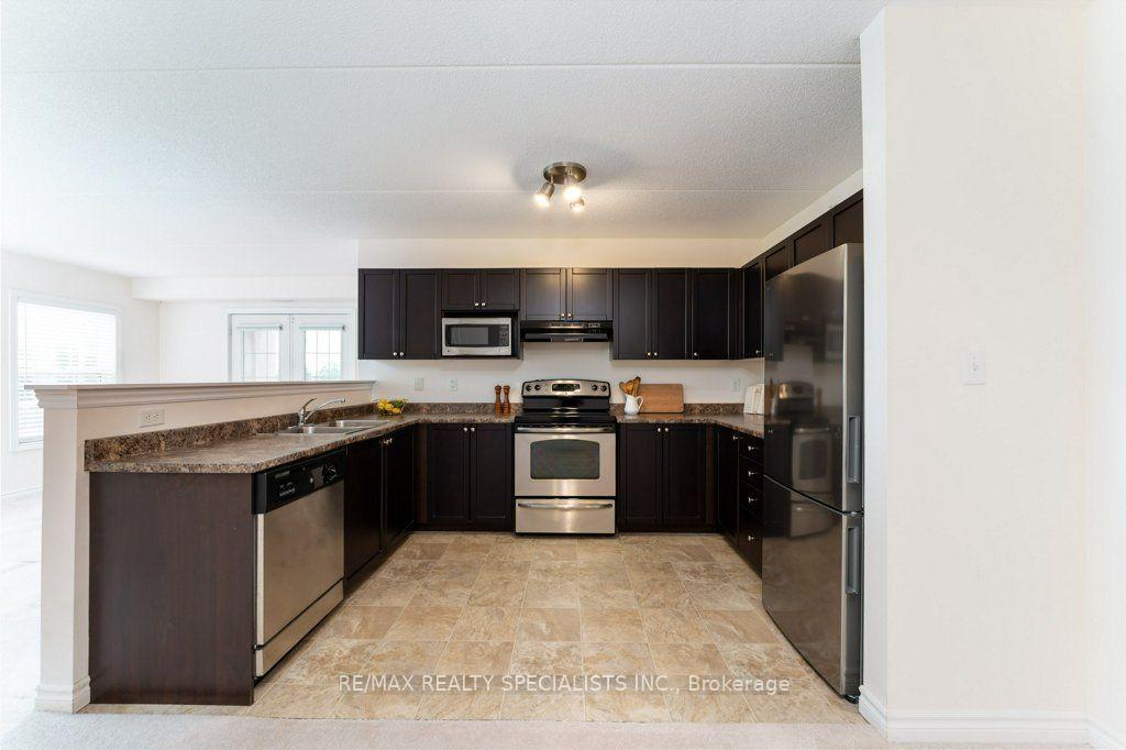 Photo 10 of Unit 313, 1340 Main Street E, Milton, Dempsey — HOMEH