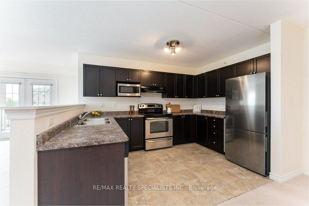 Photo 11 of Unit 313, 1340 Main Street E, Milton, Dempsey — HOMEH
