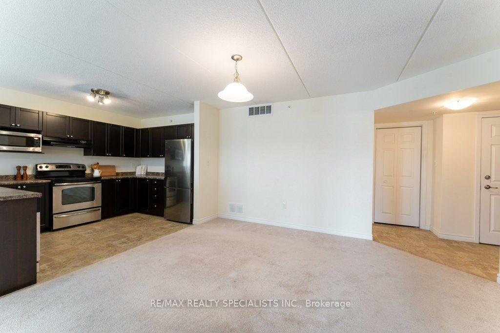 Photo 5 of Unit 313, 1340 Main Street E, Milton, Dempsey — HOMEH