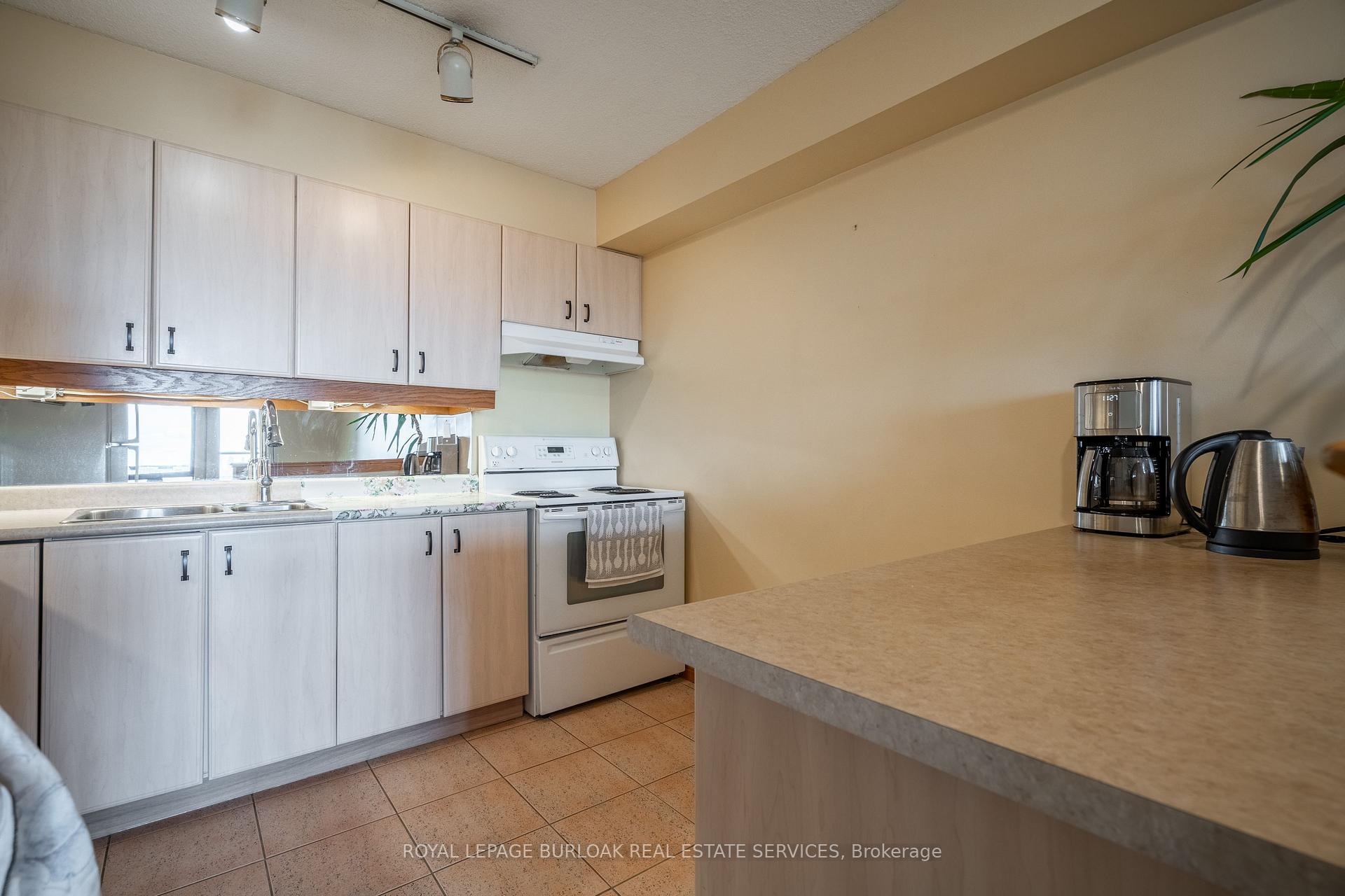 Photo 11 of Unit C34, 300 Mill Road, Etobicoke, Markland Wood — HOMEH