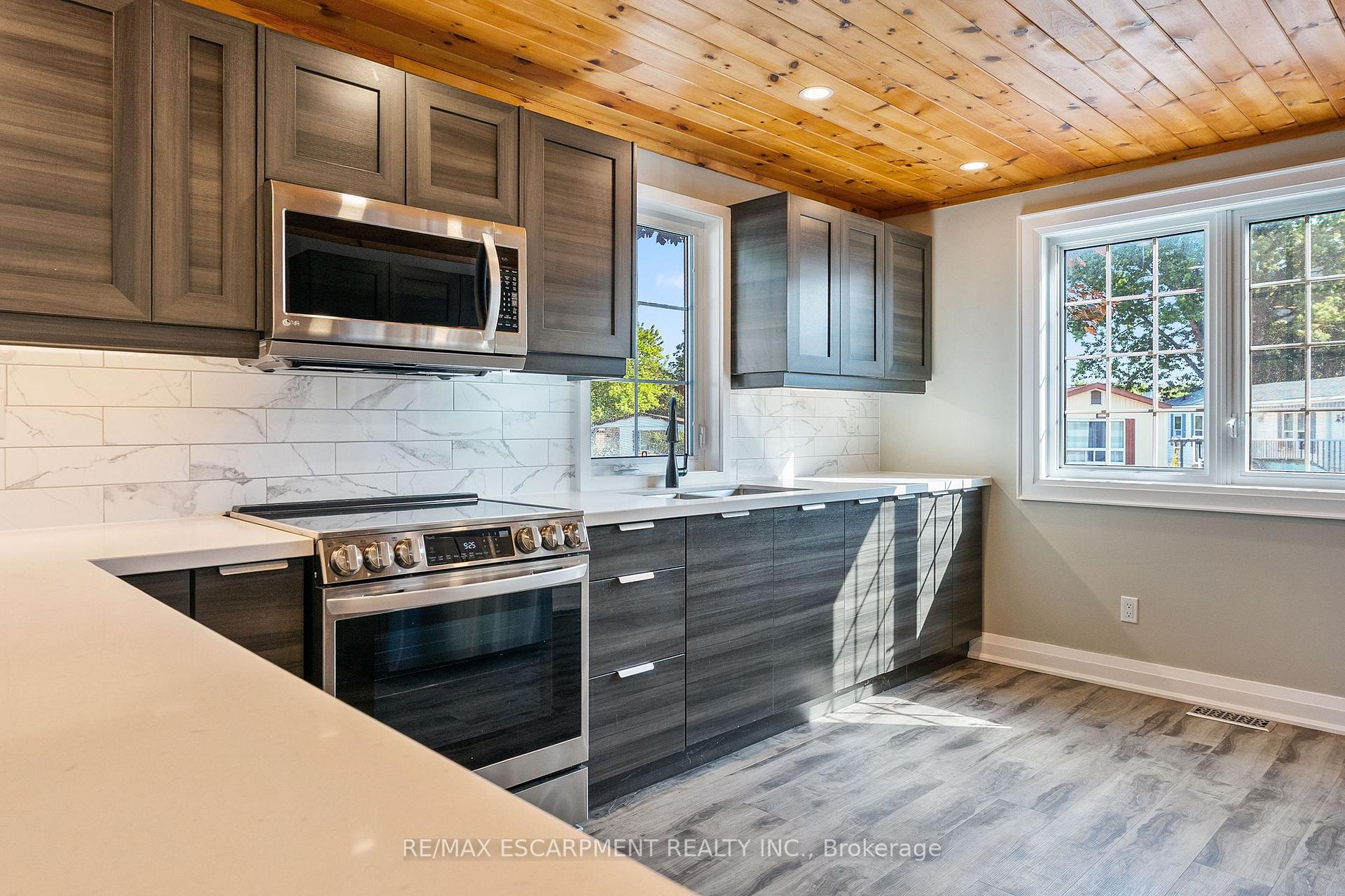 Photo 12 of Unit 19, 3233 Derry Road E, Mississauga, Malton — HOMEH