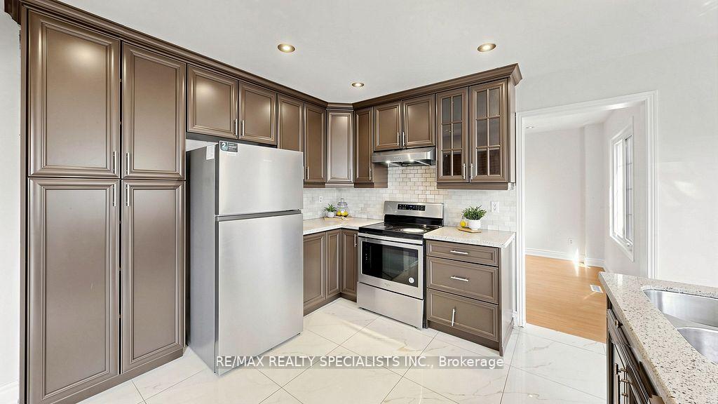 Photo 9 of 59 Sunforest Drive, Brampton, Heart Lake West — HOMEH